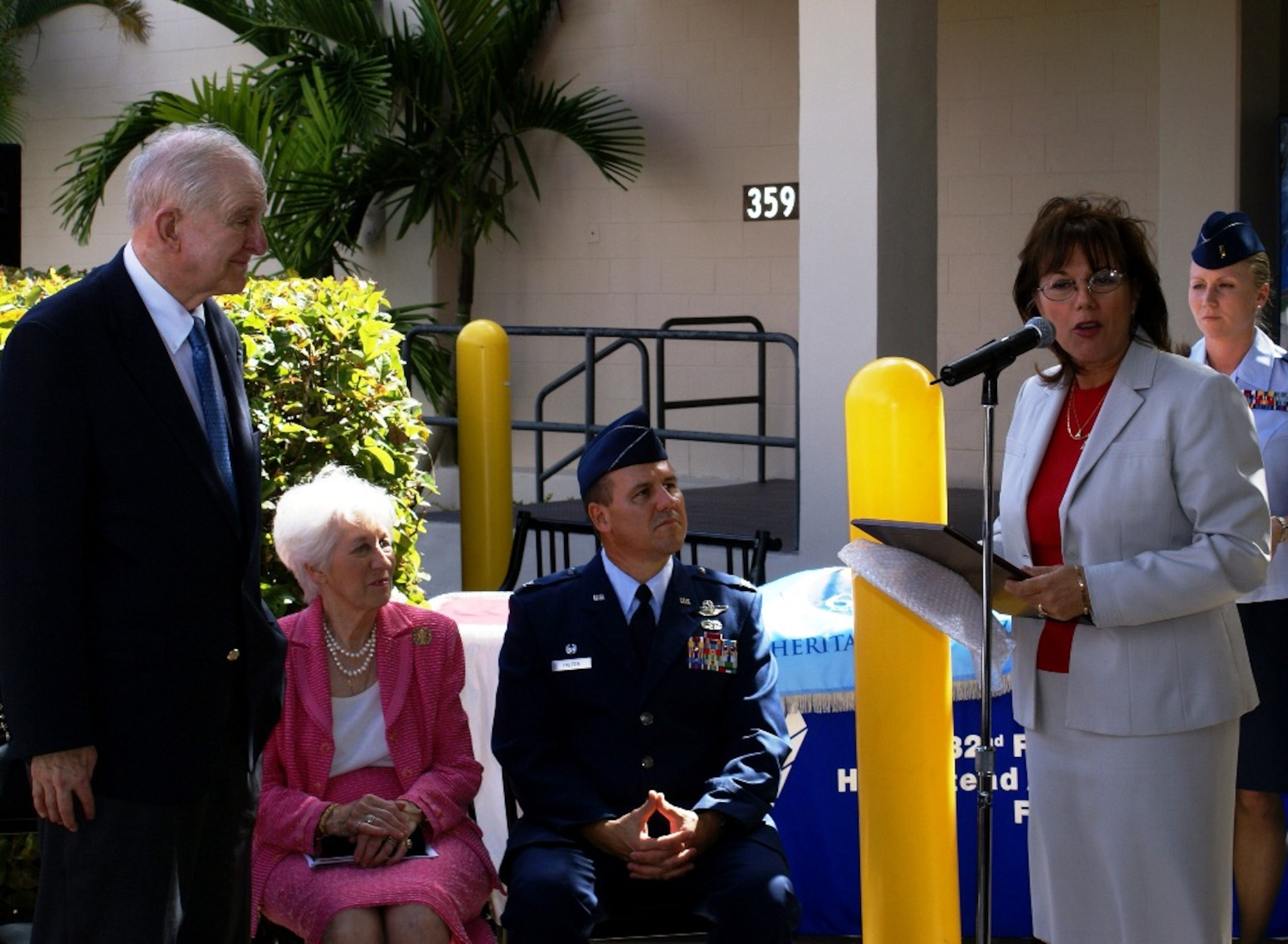 City of Homestead Mayor Lynda Bell gives a proclamation and offers U.S. Congressman Sam Johnson the key to the city of Homestead during the dedication ceremony renaming the base fitness center as the “Sam Johnson Fitness Center” on Feb. 4. Servicemembers, elected officials and prominent members of the community filled the audience in front of the Sam Johnson Fitness Center for a tribute to the highly decorated Air Force fighter pilot who flew combat missions in both the Korean and Vietnam Wars and spent nearly seven years as a Prisoner of War in Hanoi. (U.S. Air Force photo/Tim Norton)