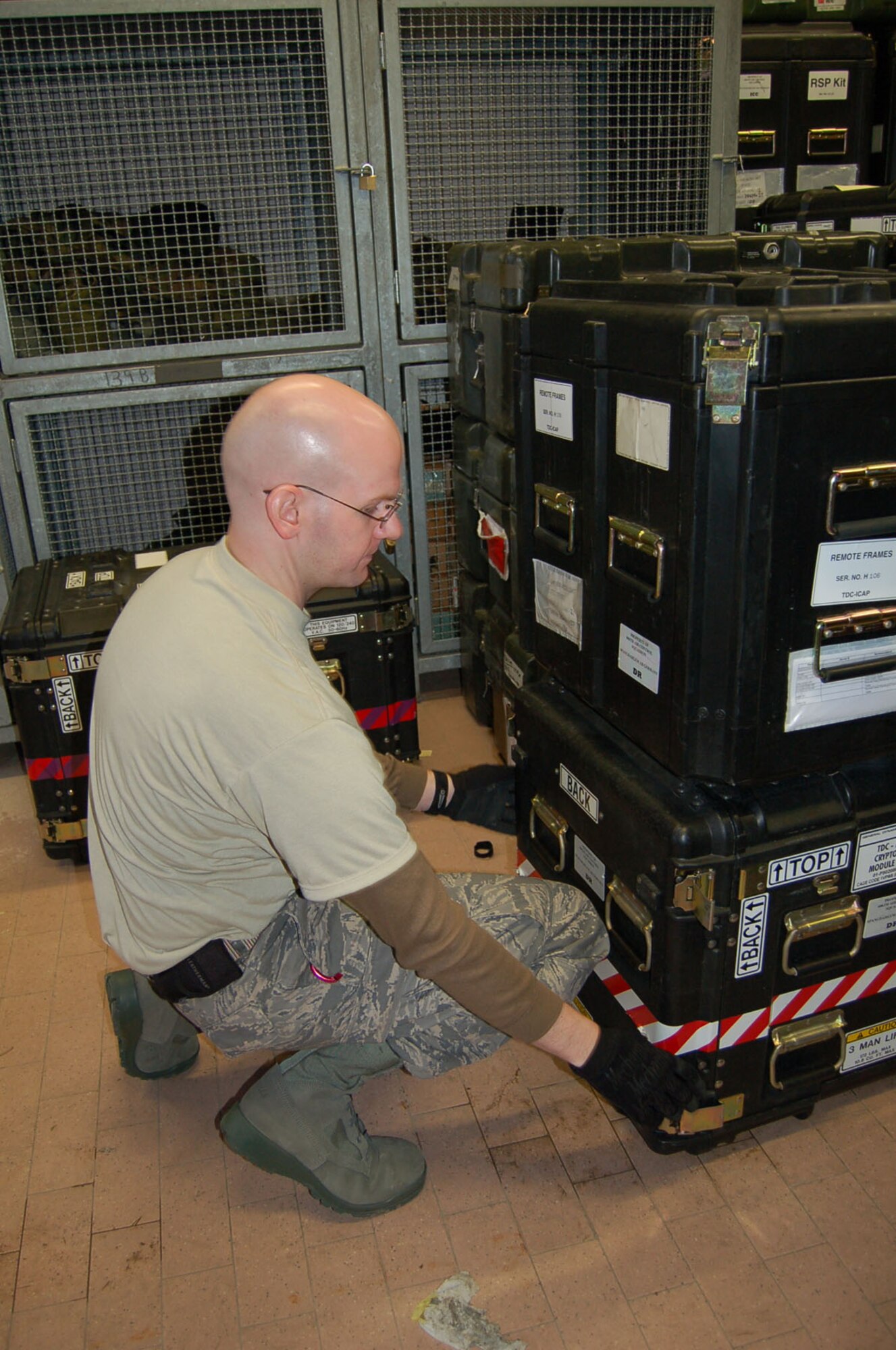 SPANGDAHLEM AIR BASE, Germany – Staff Sgt. Jacob Servia, 606th Air Control Squadron, inventories and packs equipment. (U.S. Air Force photo/Staff Sgt. Tammie Moore)