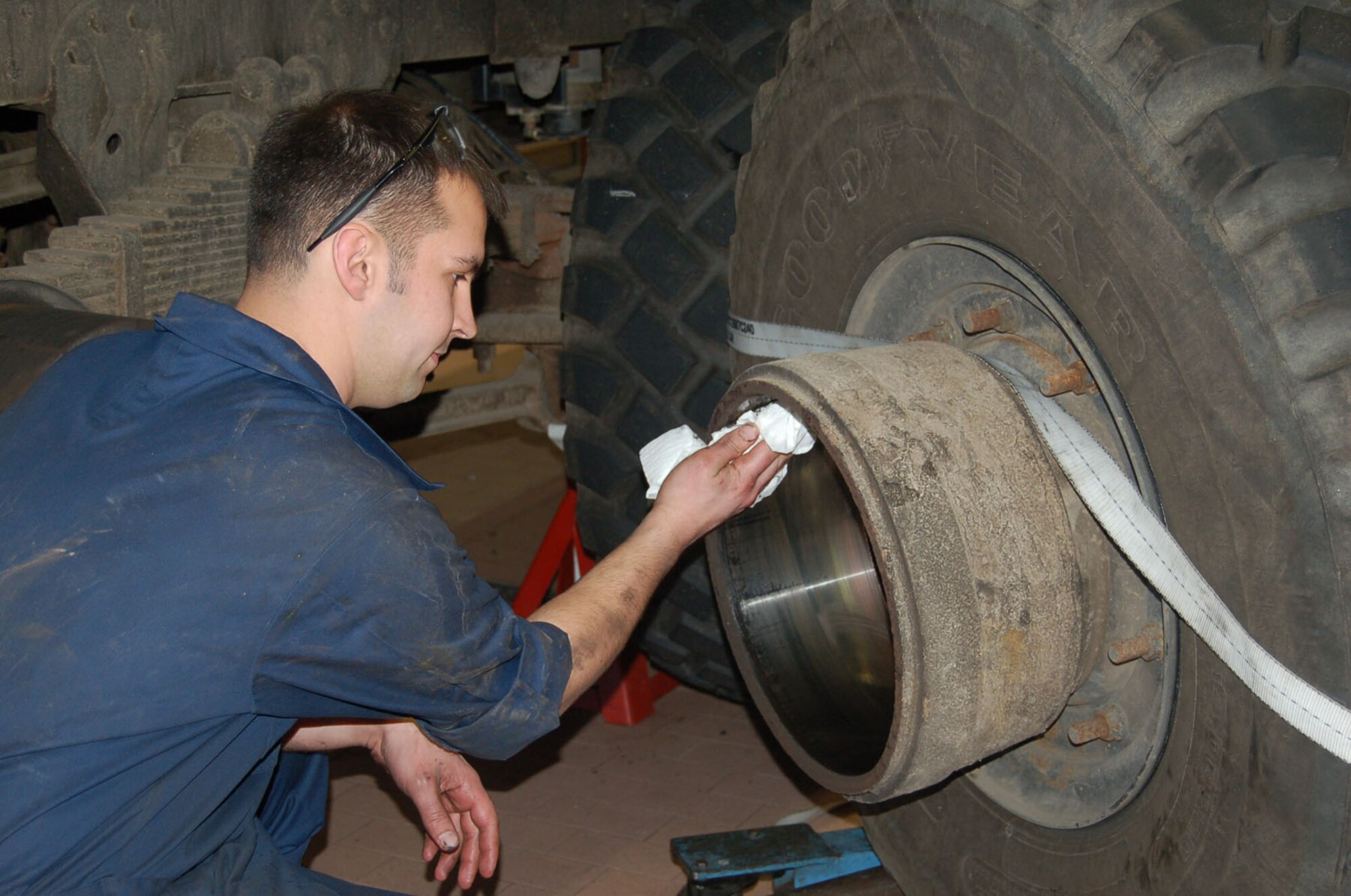 SPANGDAHLEM AIR BASE, Germany – Staff Sgt. Keith Pierson, 606th Air Control Squadron, does a wheel bearing repack. The 606th ACS vehicle maintainers perform wheel bearing repacks annually. (Photo by Sequoia Montgomery)