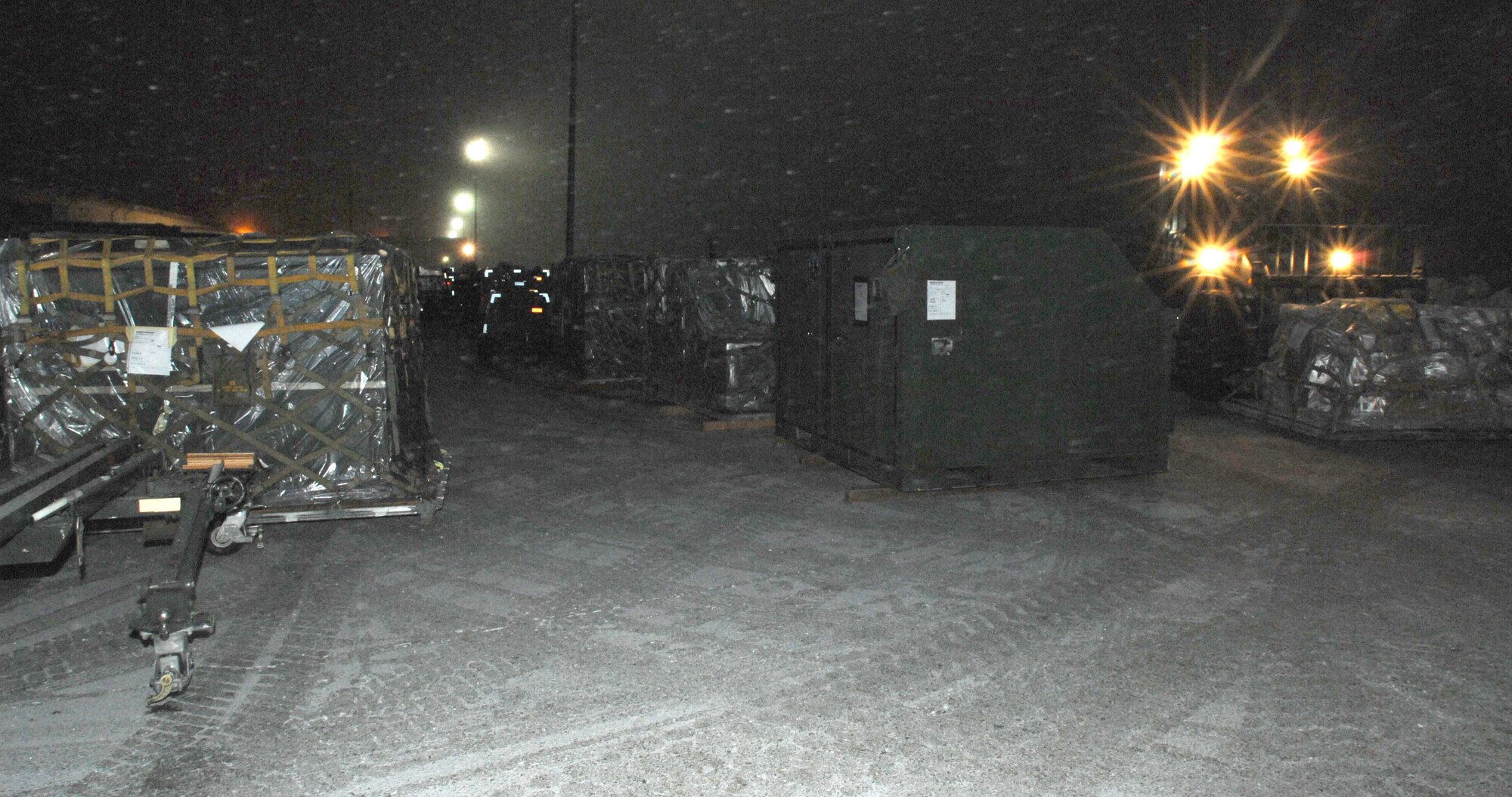 MOUNTAIN HOME AIR FORCE BASE, Idaho-- Members from the 366th Equipment Maintenance Squadron process pallets of cargo during phase I of Sharpshooter 08-03 Operation Readiness Exercise here Feb. 2. Units across the base are participating in the exercise to prepare personnel and equipment for the upcoming March 2008 Operational Readiness Inspection. (U.S. Air Force photo/ Airman 1st Class Stephany Miller)
