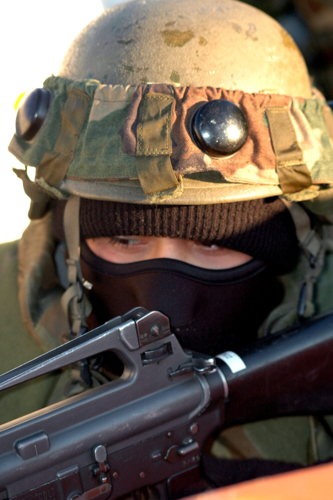 A U.S. Air Force Airman deployed to Air Force Exercise Eagle Flag 08-2 respond to an opposing forces attack on their camp during a scenario for the exercise Jan. 23, 2008, at Naval Air Engineering Station Lakehurst, N.J.  The exercise is operated by the U.S. Air Force Expeditionary Center's Expeditionary Operations School and the 421st Combat Training Squadron from Fort Dix, N.J.  (U.S. Air Force Photo/Tech. Sgt. Scott T. Sturkol)