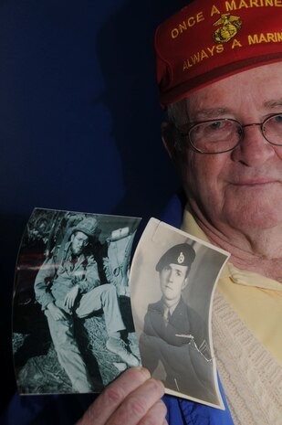Former Cpl. Daniel Sharkey displays photos taken of himself as a young Marine.  Sharkey participated in the Chosin Reservoir campaign as an Air and Naval Gunfire Liaison Company representative attached to 2nd Battalion, 5th Marine Regiment, 1st Marine Division, and was among the first to be interviewed for the documentary, "Chosin."