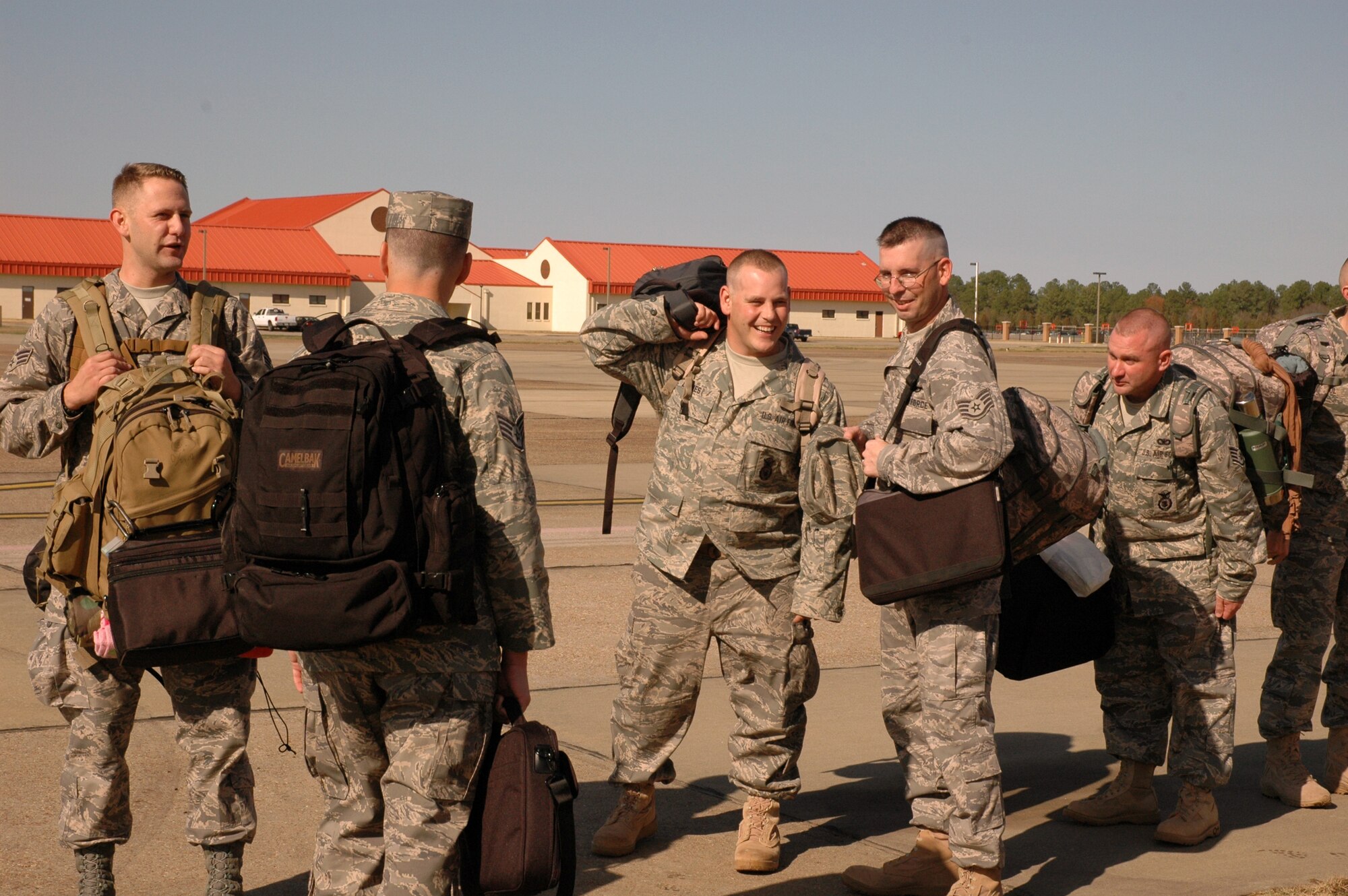 Members of the 908th Airlift Wing's 908th Security Forces Squadron prepare to board a KC-10 aircraft from McGuire AFB, N.J., Feb. 6, 2008. The Air Force Reservists are headed for Southwest Asia to provide support for Operation Iraqi Freedom. (U.S. Air Force photo by Mr. Jeff Melvin)