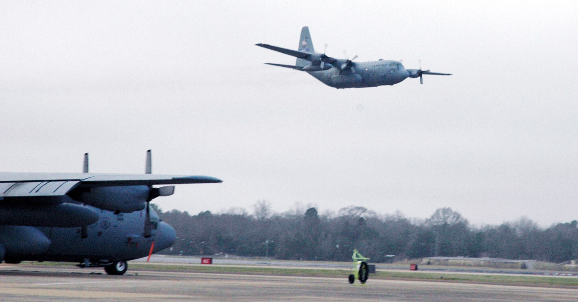 An 908th Airlift Wing C-130 lifts off from the Maxwell AFB, Ala. flightline Feb. 5, 2008, bound for Southwest Asia to provide support for Operation Iraqi Freedom. The Montgomery, Ala.-based wing is the first C-130 unit in Air Force Reserve Command to deploy under a new rotation system filled by volunteers. (U.S. Air Force photo by Mr. Jeff Melvin)