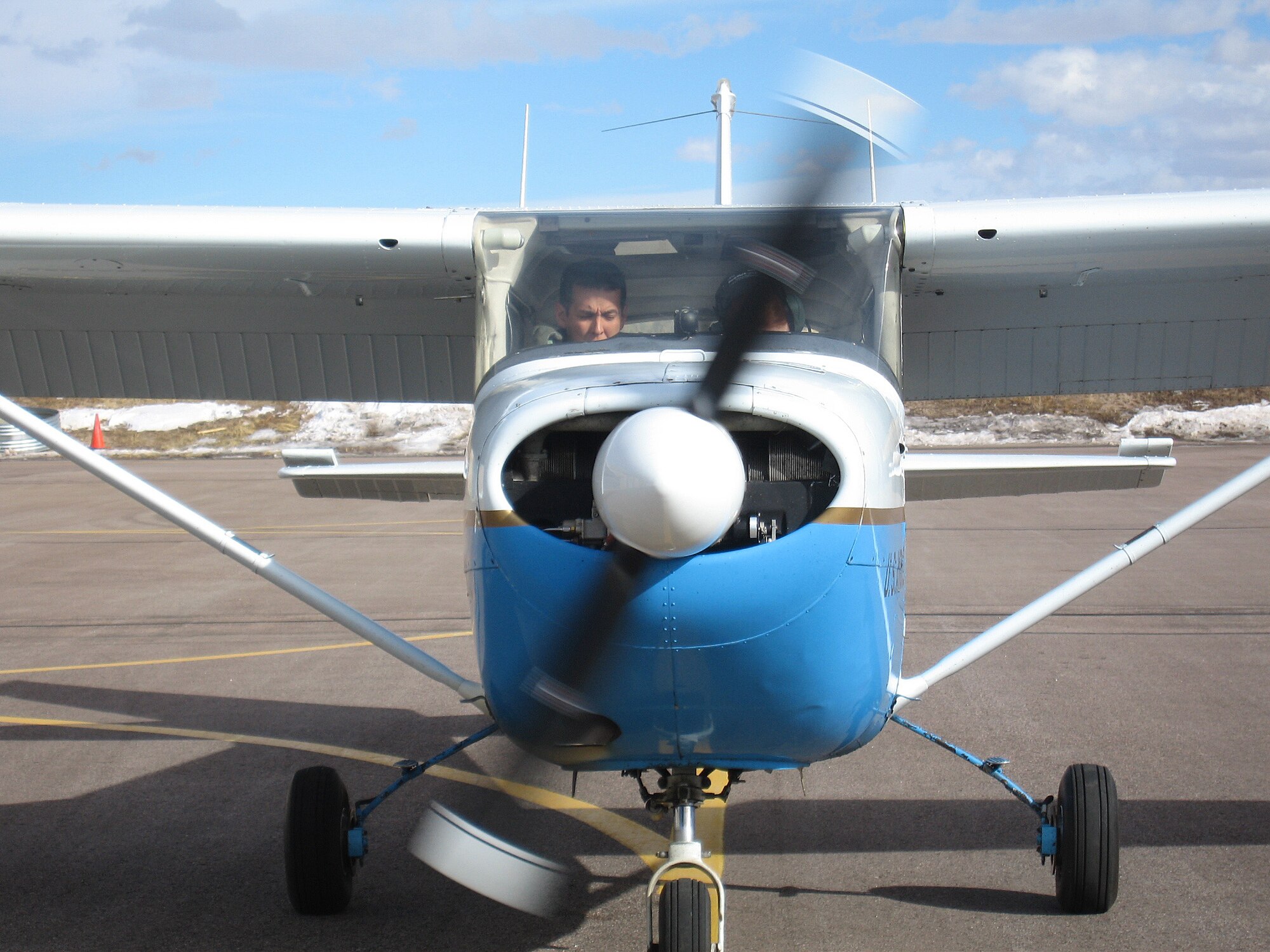 Capt. Steve Priddy (left) and Cadet 2nd Class Brooke Mauss prepare to take flight in a T-41 Mescalero Feb. 1 at the U.S. Air Force Academy.  Captain Priddy is an instructor pilot with the 557th Flying Training Squadron and Cadet Mauss is a member of Cadet Squadron 5 participating in the "Jump Start" test program.  The test program marks the return to powered flight at the Air Force Academy. (U.S. Air Force photo/Capt. Ginny Walker) 