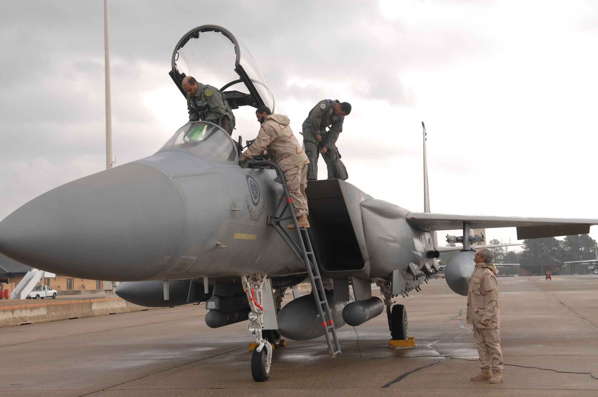 The Royal Saudi Air Force maintainers help their pilots get ready for take off on February 1, 2008, Seymour Johnson AFB, North Carolina.  The Royal Saudi Air Force passes through Seymour Johnson AFB, to participate in Red Flag at Nellis, AFB, Las Vegas.  

(US Air Force photo by Airman First Class Salma Din)(Released)
