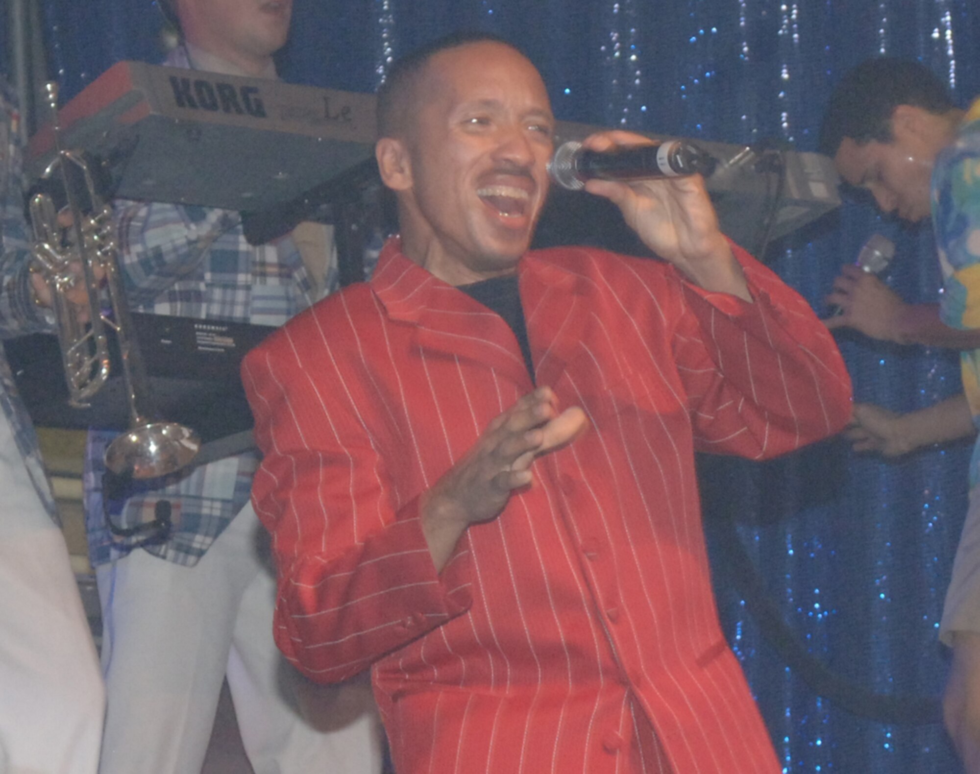 Technical Sgt. Keith Martin, an information manager assigned to the 43rd Flying Training Squadron, is one of nine vocalists to this talented group of expeditionary entertainers.(U.S. Air Force photo by Airman 1st Class Danielle Hill)