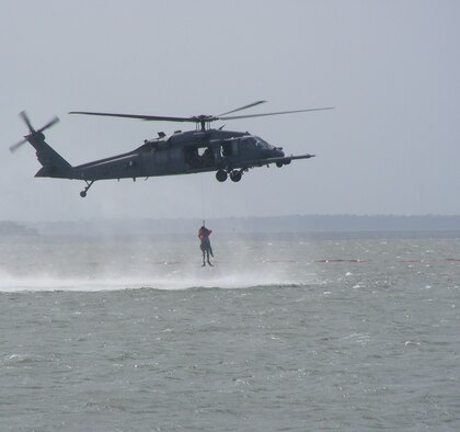 Air Force Reserve aircrews and pararescuemen from the 920th Rescue Wing conduct astronaut recovery training during the World Space Expo on the Banana River next to Kennedy Space Center Nov. 2.   (U.S. Air Force Photo/Staff Sgt. Paul Flipse)