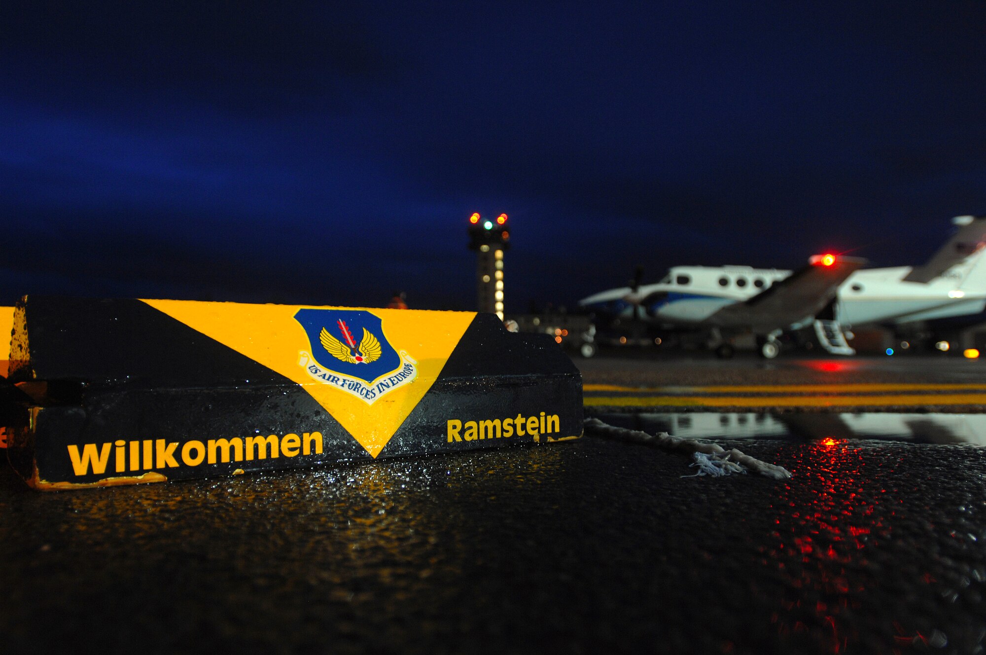 The Ramstein flightline is nonstop action day and night. Here the distinguished visitor chalks are ready to be put in place for the arriving distinguished visitor, Lt. Gen. Laszlo Tombol, Commander Hungarian Joint Forces Command, Feb. 5.  (U.S. Air Force Photo/Airman 1st Class Kenny Holston)