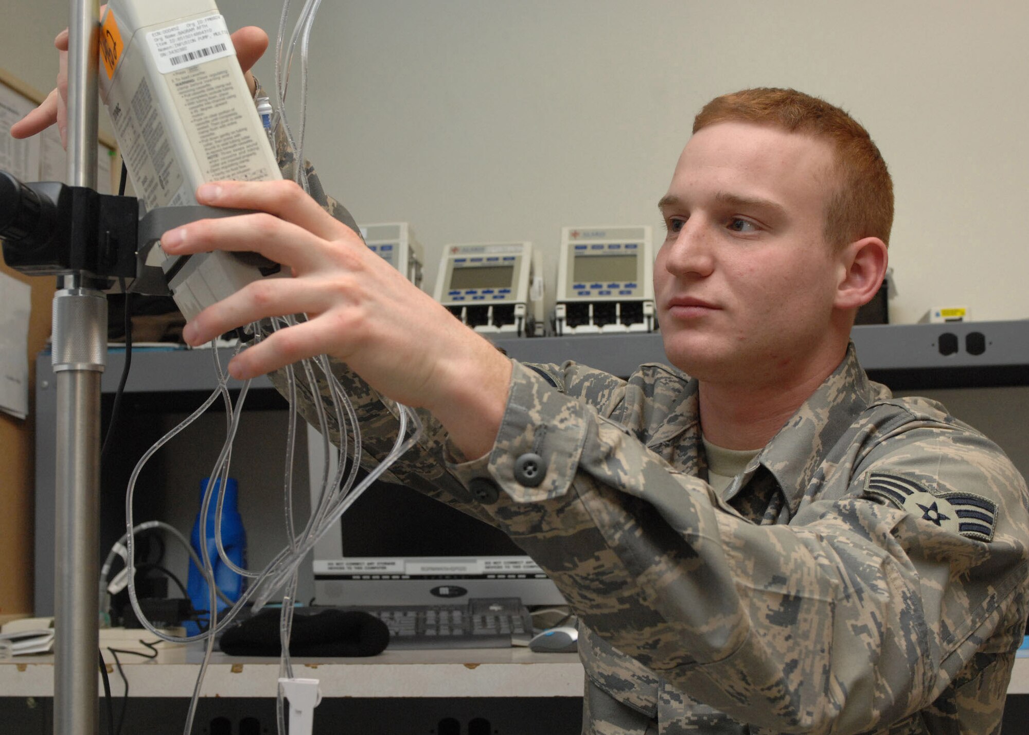 Senior Airman Michael Luc verifies the accuracy of an infusion pump used for patient medication Feb. 5 at the Craig Joint Theater Hospital at Bagram Air Base, Afghanistan. Airman Luc is a biomedical equipment technician deployed from the 60th Medical Support Squadron at Travis Air Force Base, Calif. The Bagram AB hospital is named for heroic Army medic Staff Sgt. Heathe Craig, who died while trying to save a patient in 2006. As the two were being hoisted from a ridgeline by a Blackhawk helicopter the line to the chopper snapped. Sergeant Craig and his patient fell to their deaths. (U.S. Air Force photo/Master Sgt Demetrius Lester)