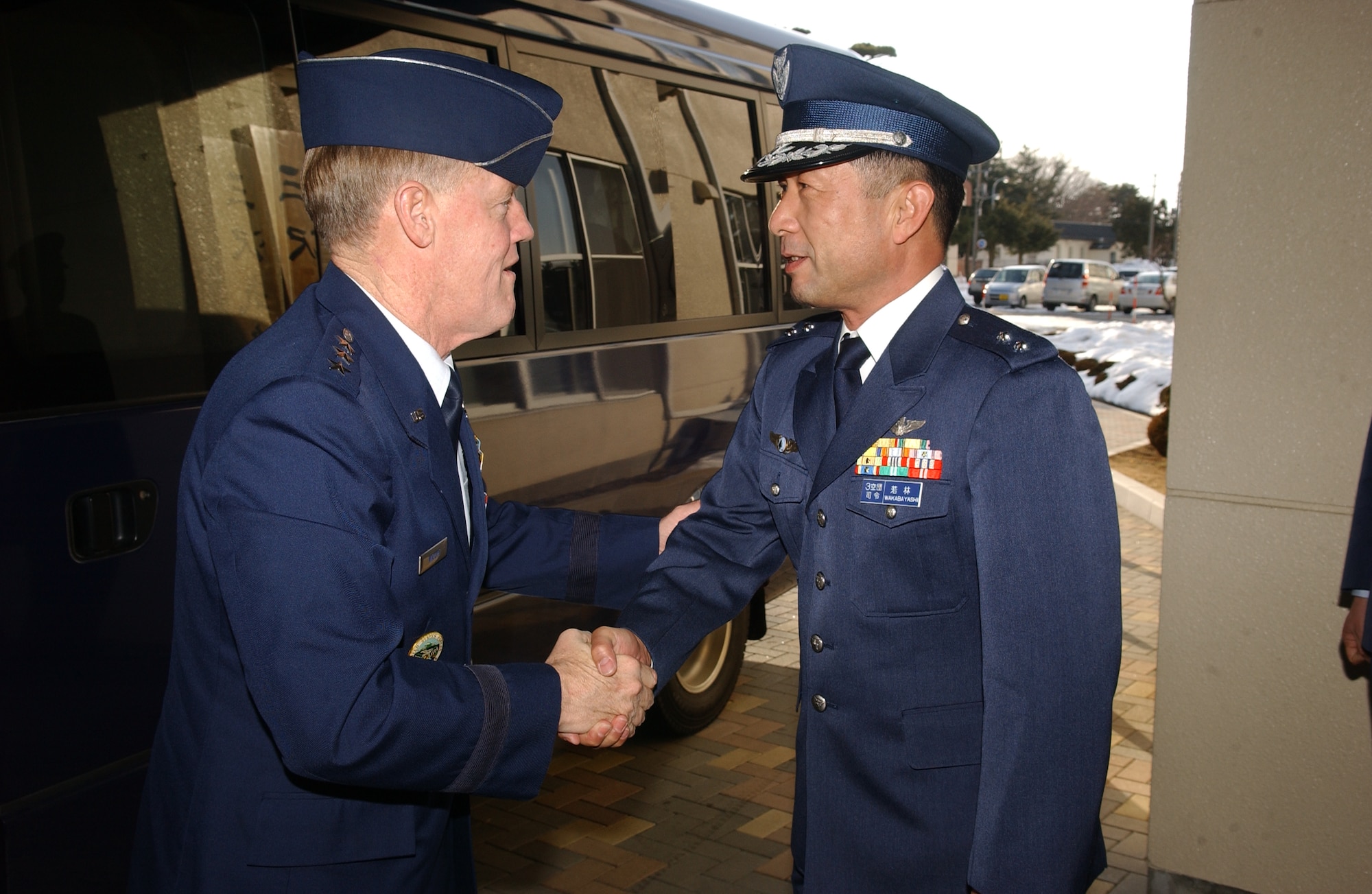 MISAWA AIR BASE, Japan -- Lt. Gen. Bruce Wright (left), 5th Air Force commander, meets with Maj. Gen. Hideo Wakabayashi (right), 3rd Air Wing commander, here on Feb. 5, 2008. General Wright visited Misawa for his final flight on Feb. 6, 2008.  (U.S. Air Force photo by Senior Airman Robert Barnett)