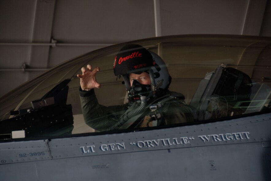 MISAWA AIR BASE, Japan -- Lt. Gen. Bruce Wright, 5th Air Force commander, makes the panther symbol before his final flight here, Feb. 6, 2008.  General Wright's flight marked his last time flying an F-16 in the U.S. Air Force. (U.S. Air Force photo by Senior Airman Laura R. McFarlane)