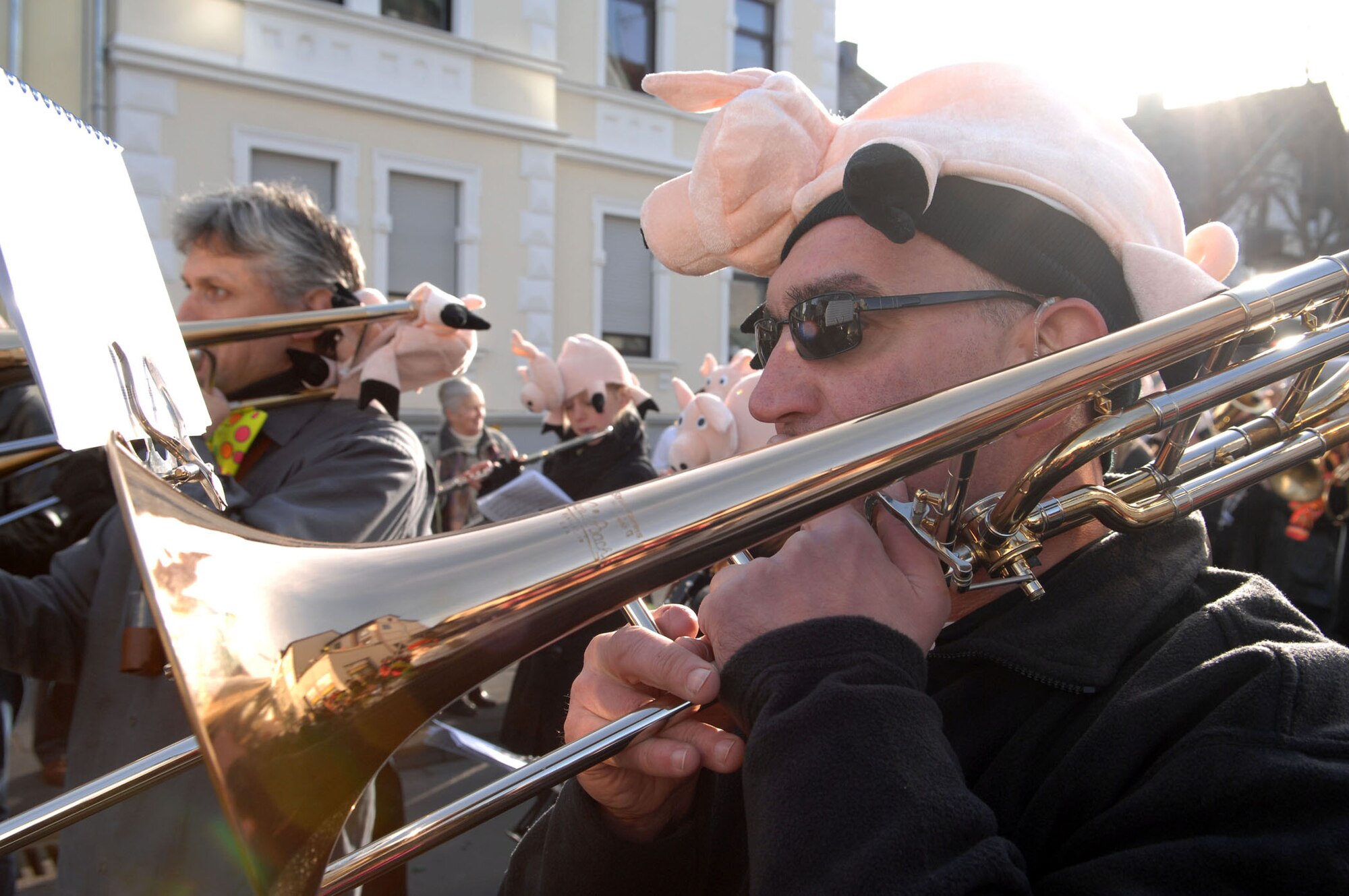 SPANGDAHLEM AIR BASE, Germany -- A trombonist from a local marching band plays a traditional German fasching song as he marches down the parade route during the Wittlich Fasching Parade, Feb. 3, 2008.  Fasching, a five-day celebration similar to Carnival, is held each year prior to the start of Lent. (U.S. Air Force photo/Senior Airman Matthew S. Bright) 