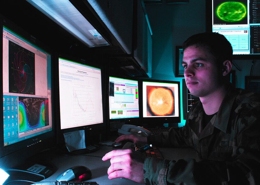 Senior Airman Aaron Jones, 25, forecasts the astro-geophysical environment used to determine solar weather effects on Department of Defense systems and operations. Jones, originally from Ft. Worth, Texas, is a space weather forecaster with the 2nd Weather Group's Space Weather Flight. The group is located at Offutt Air Force Base, Neb., as part of the Air Force Weather Agency. (Photo by G. A. Volb)