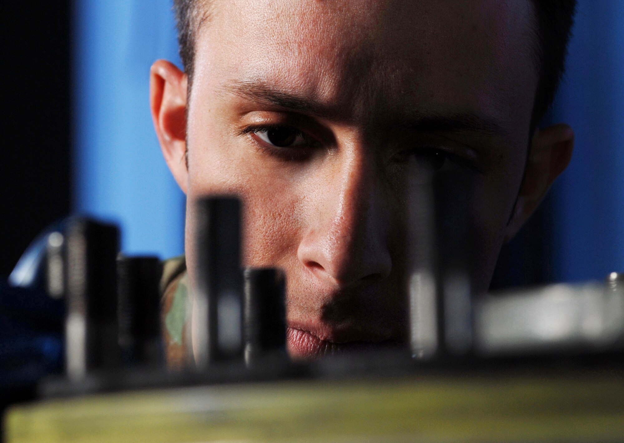 Staff Sgt. Greg Thompson, an aircraft mechanic from the Aero Repair Shop at March Air Reserve Base, Calif., visually inspects the bolts Feb. 3 on a C-17 Globemaster III cargo aircraft wheel.  March ARB, located in Southern California, is home to the largest air mobility wing in the Air Force Reserve Command. It also is home to units from the Army Reserve, Navy Reserve, Marine Corps Reserve and Air National Guard. (U.S. Air Force photo/Val Gempis)