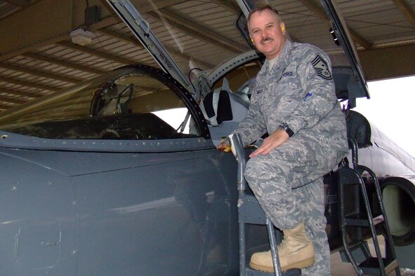 Chief Master Sgt. Jack De Forrest gets a look at "his" old plane: T-38 #68-8190 on the flightline at Randolph Air Force Base, Texas, Jan. 29.  Chief De Forrest was the dedicated crew chief for that aircraft when he served at Randolph more than 23 years ago as a staff sergeant.  Chief De Forrest retires Feb. 15 after more than 29 years in uniform.  (U.S. Air Force photo)