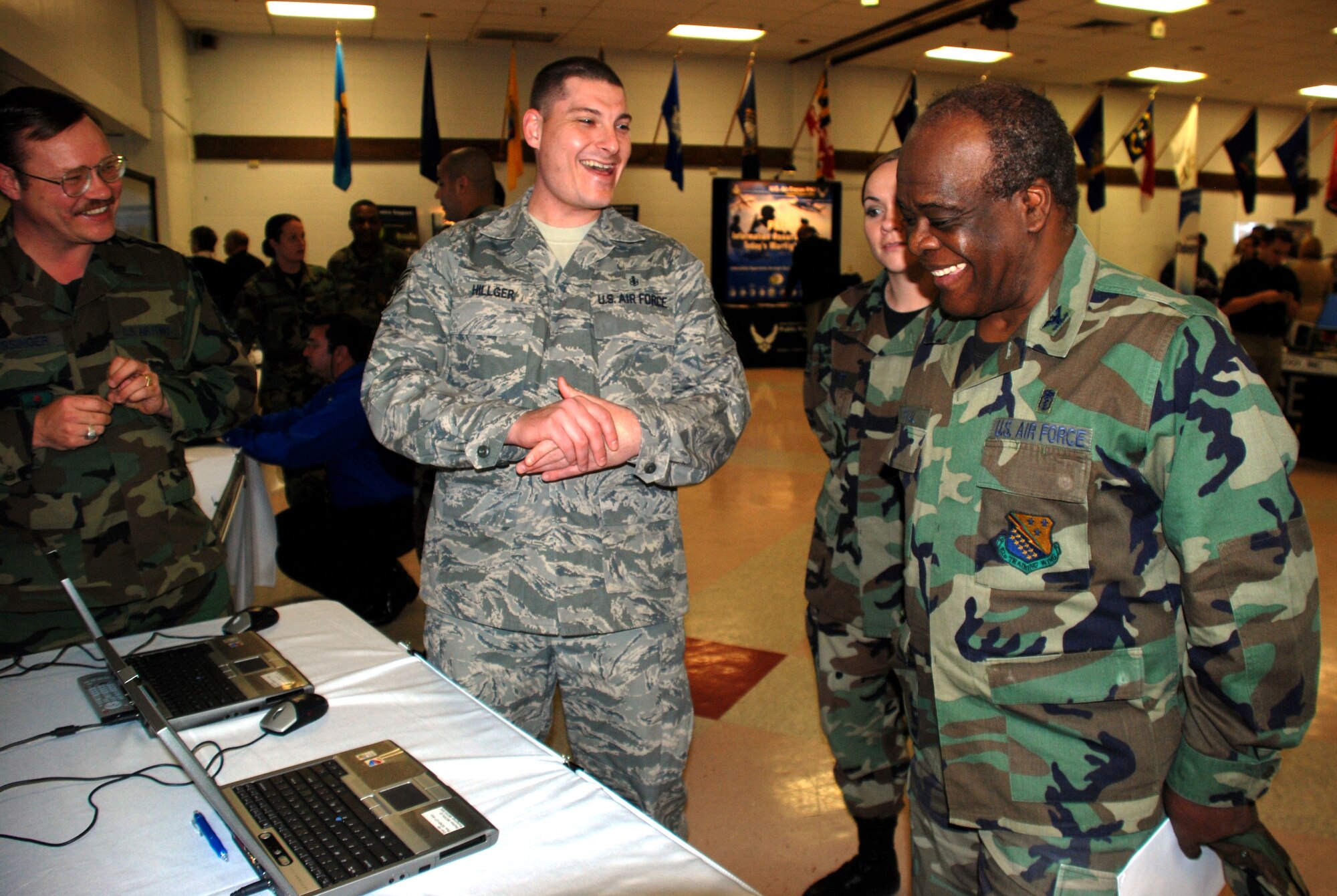 Staff Sgt. Terry Hillger, 882nd Training Support Squadron, shows Col. Jean Dorval, 82nd Medical Group chief of general surgery, various computer-based study materials created by the 882nd Training Group Instructional Training Unit for use by Airmen in technical training Feb. 7 at the Sheppard Tech Expo. The tech expo gives Team Sheppard members a chance to view the latest training technology and to learn how to integrate the technology into their classrooms. (U.S. Air Force photo/Airman 1st Class Jacob Corbin)