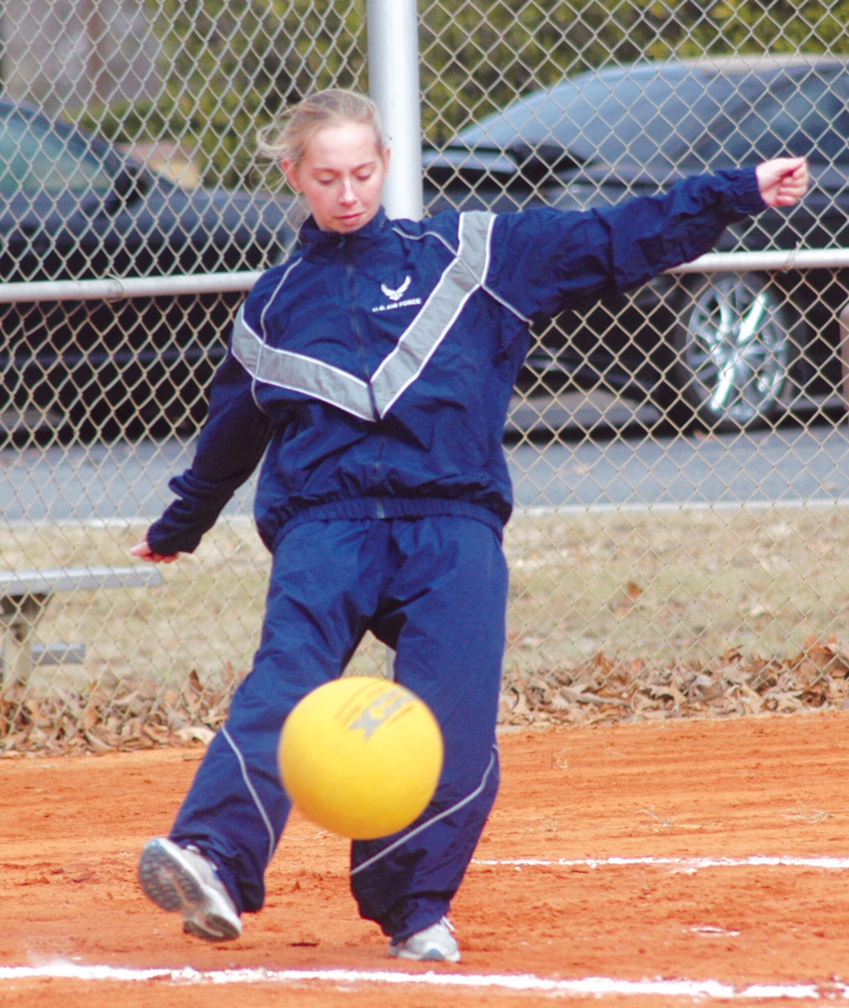 SSgt. Holly Willis, 653rd CLSS, takes her turn at kickball during Sports Day Jan. 31. U. S. Air Force photo by Sue Sapp  