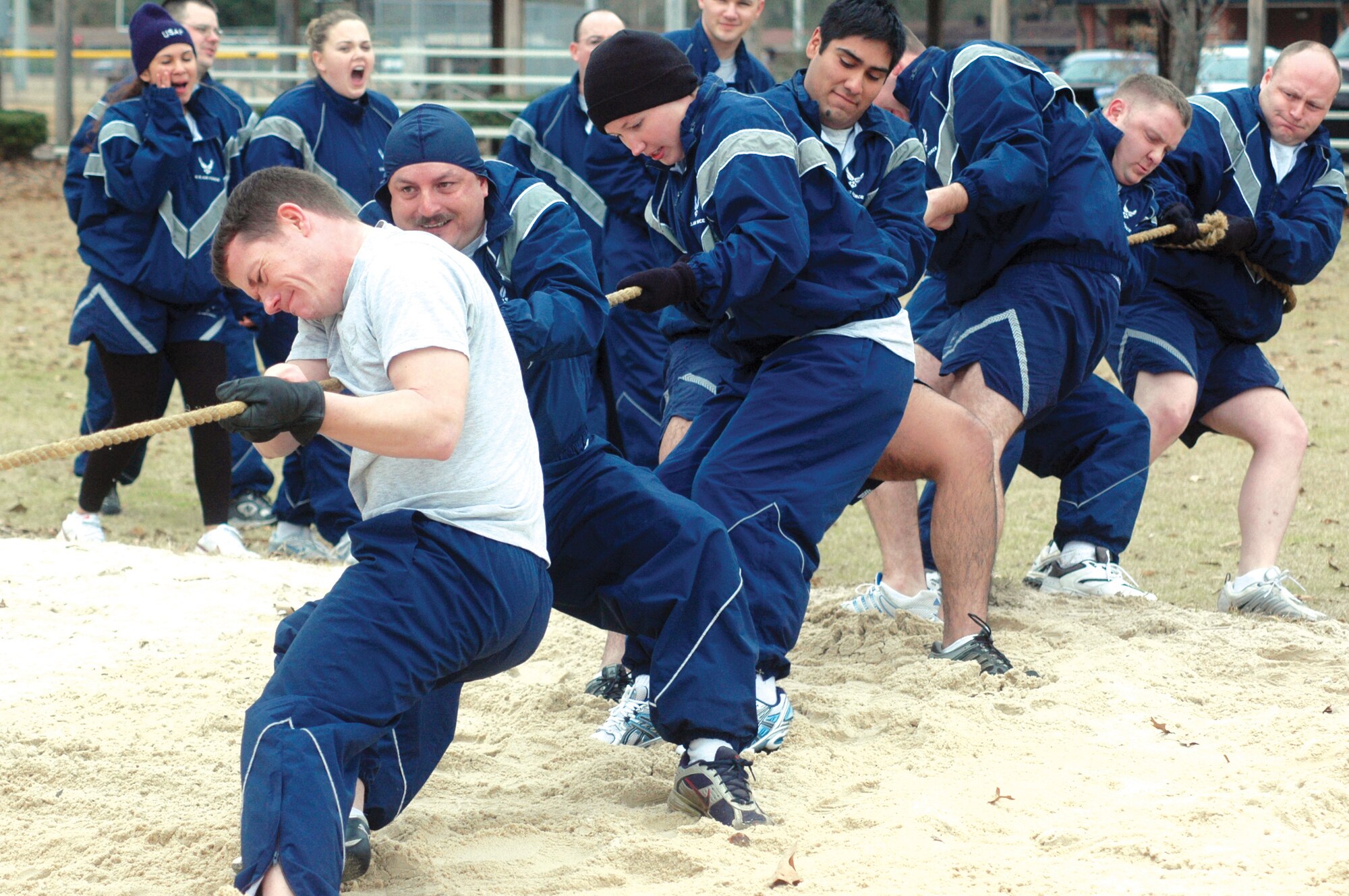 The 78th LRS team puts their muscle into the tug of war competition. The event was one of many which pitted unit against unit. U. S. Air Force photo by Sue Sapp