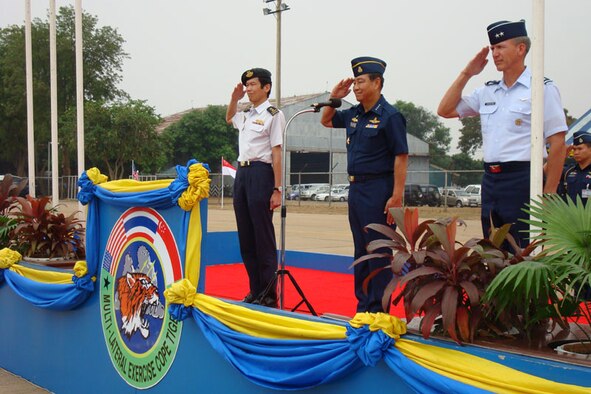 KORAT ROYAL THAI AIR BASE, Thailand – Maj. Gen. Jeffrey Remington (right) represents the U.S. military at the official closing ceremony of Exercise Cope Tiger 2008 here Feb. 5 beside the chief of the Air Force, Republic of Singapore Air Force, Maj. Gen. Ng, Chee Khern (far left), and commander-in-chief of the Royal Thai Air Force, Air Chief Marshal Chalit Pukbhasuk. General Remington is the director of air, space and information operations at Headquarters, Pacific Air Forces. (U.S. Air Force photo/Capt. Renee Lee)