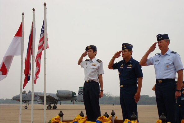 KORAT ROYAL THAI AIR BASE, Thailand – Maj. Gen. Jeffrey Remington (right) represents the U.S. military at the official closing ceremony of Exercise Cope Tiger 2008 here Feb. 5 beside the chief of the Air Force, Republic of Singapore Air Force, Maj. Gen. Ng, Chee Khern (far left), and commander-in-chief of the Royal Thai Air Force, Air Chief Marshal Chalit Pukbhasuk. General Remington is the director of air, space and information operations at Headquarters, Pacific Air Forces. (U.S. Air Force photo/Capt. Renee Lee)