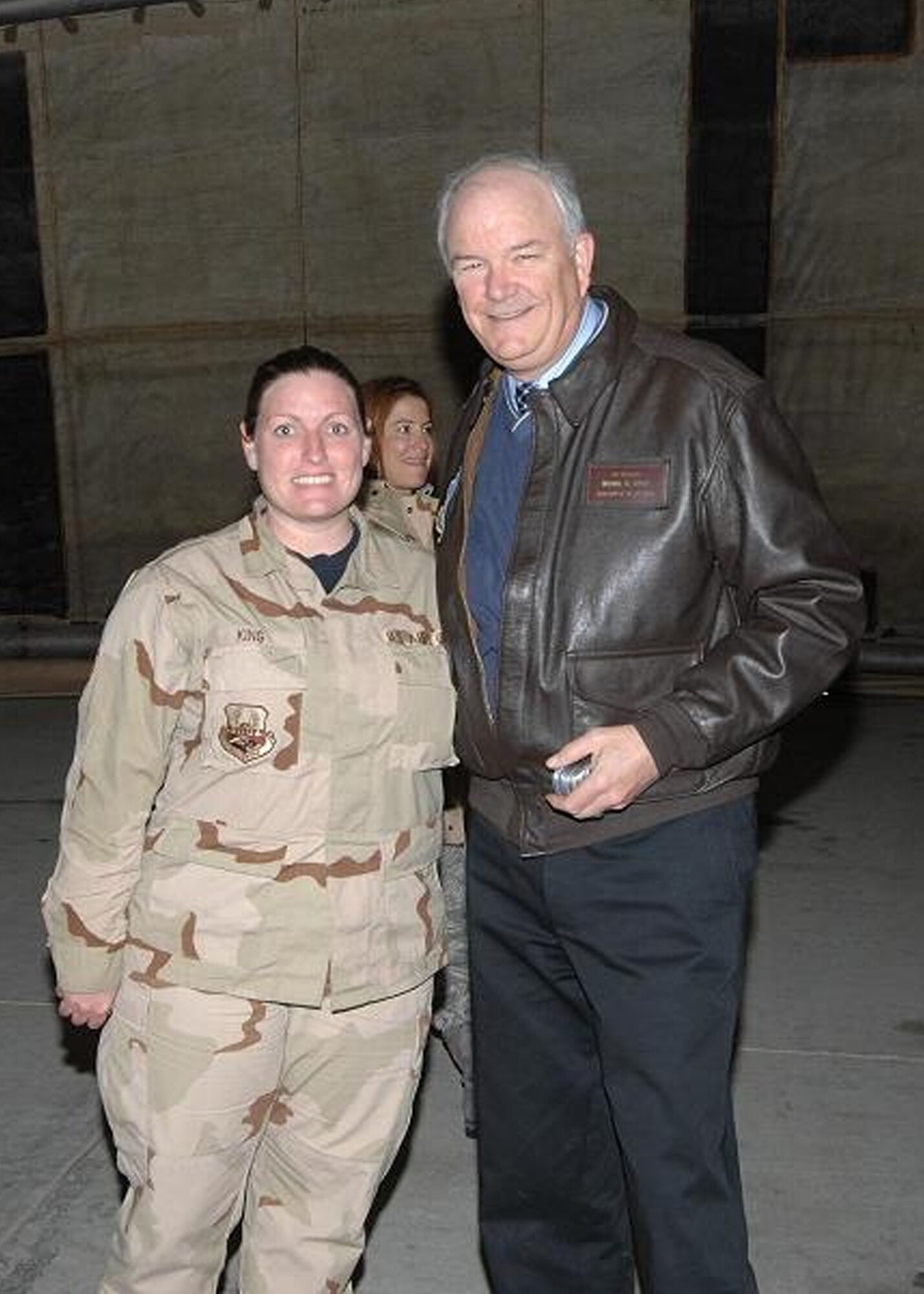BAGRAM AIR BASE, Afghanistan – Secretary of the Air Force Michael W. Wynne recognizes Staff Sgt. Jodi King, 455th Expeditionary Aircraft Maintenance Unit, with his coin for her outstanding performance while deployed Feb. 4, 2008. Sergeant King is deployed from Spangdahlem Air Base, Germany. (U.S. Air Force photo/Master Sgt. Demetrius Lester)