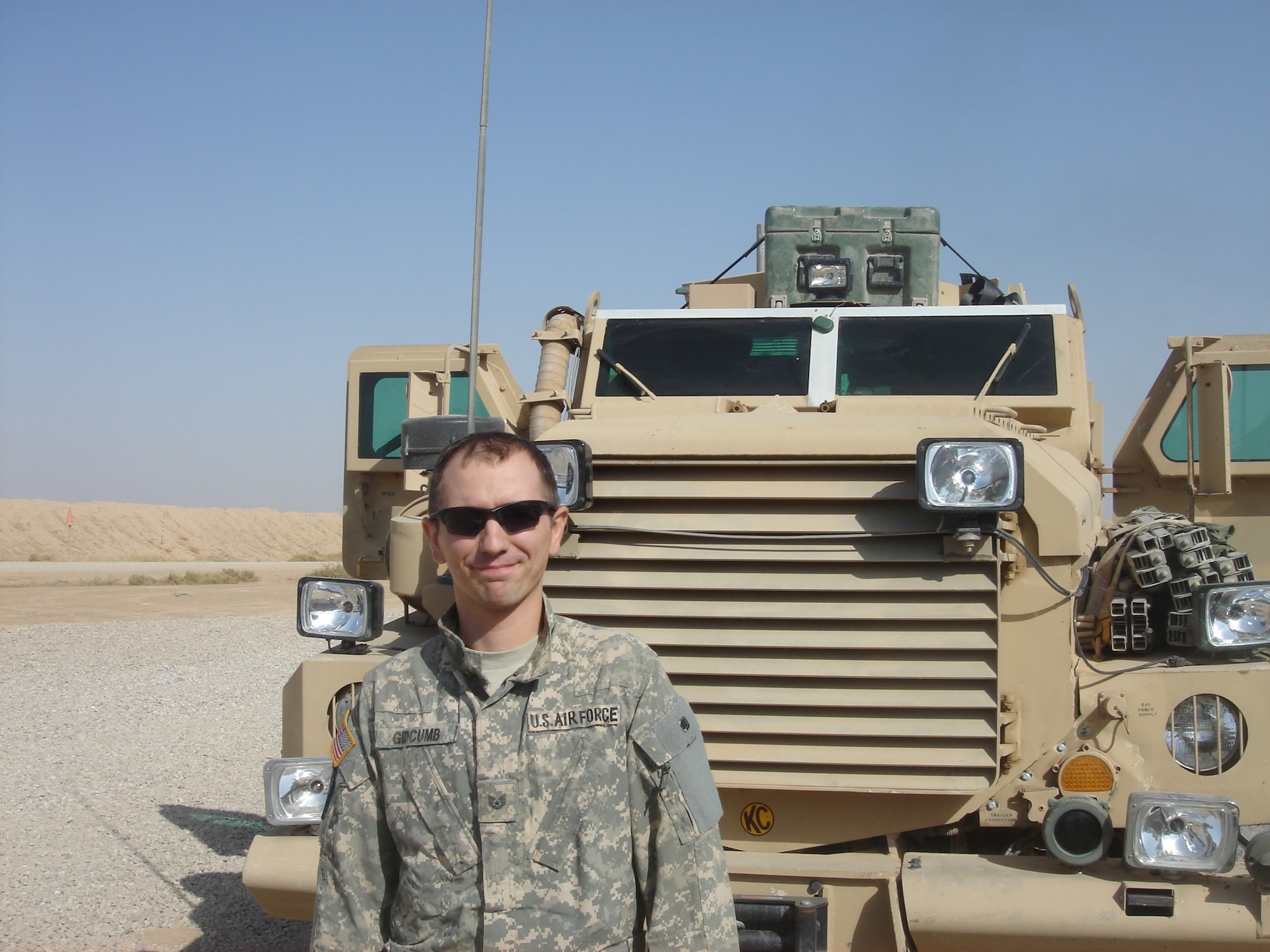 KIRKUK REGIONAL AIR BASE, Iraq -- Tech. Sgt. Joshua Gidcumb, 52nd Civil Engineer explosive ordnance disposal, was presented a Purple Heart and a second Bronze Star from the Army while deployed in support of Operation Iraqi Freedom. (Courtesy photo)