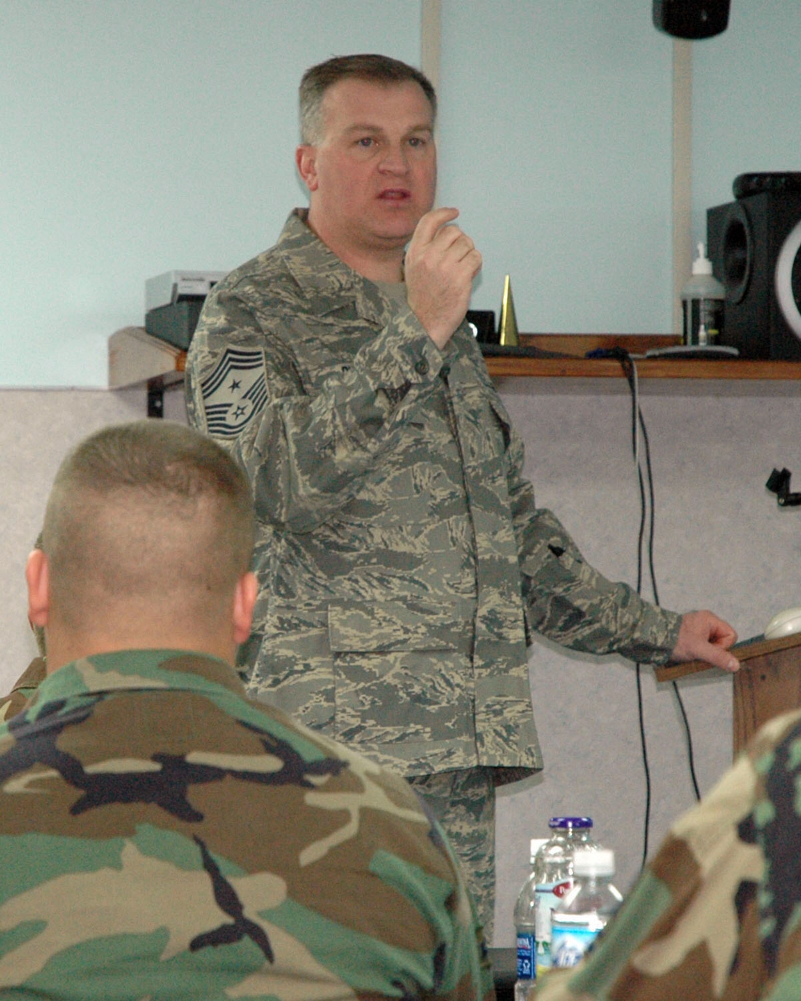 YOUNGSTOWN AIR RESERVE STATION, Ohio – The Air Force Reserve's 910th Airlift Wing's new Command Chief Master Sgt.,Troy K. Rhoades addresses a group of Airmen regarding the wing's upcoming ORI in a classroom here during the February UTA. U.S. Air Force photo/Senior Airman Ann Wilkins Jefferson.