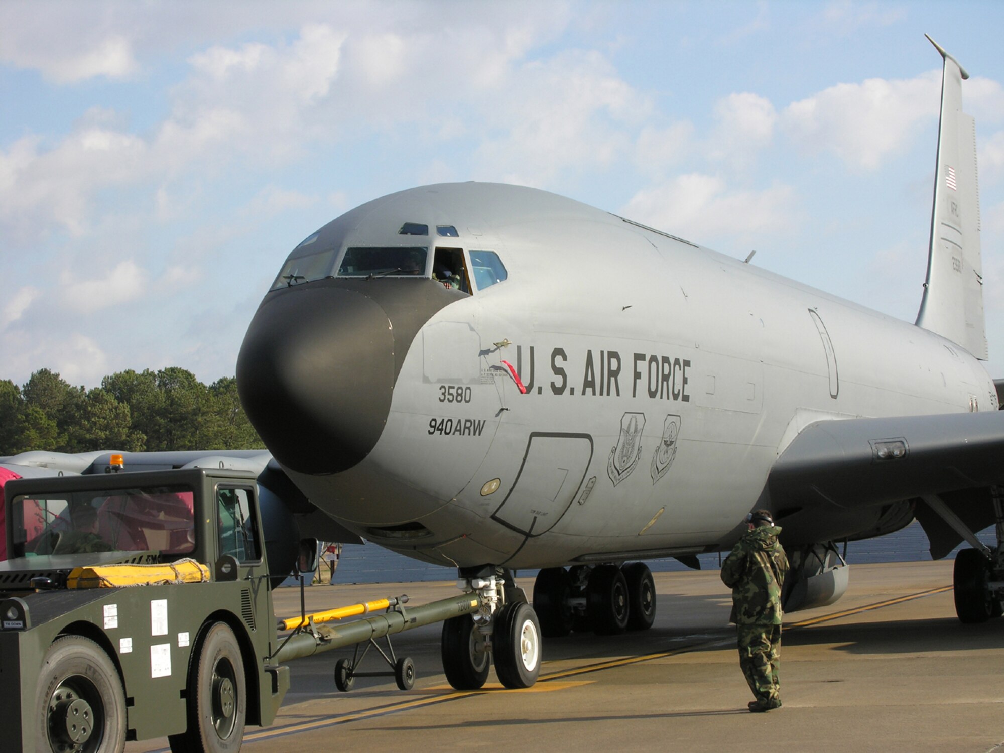 SEYMOUR JOHNSON AIR FORCE BASE, N.C. -- Members of the 916th Maintenance Group move the new addition to the 916th Air Refueling Wing to a location on the flightline.  The KC-135 from the 940th Air Refueling Wing, Beale Air Force Base, Calif., is just one of the eight airplanes that will be added to the 916th ARW as part of the Base Realignment and Closure Commission recommendations. Two of the eight planes arrived in late January to the North Carolina Air Force Reserve wing.  U. S. Air Force Photo by Donna Lea