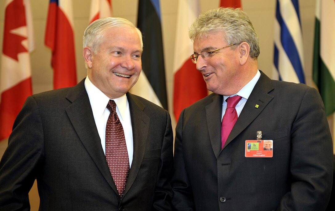 Defense Secretary Robert M. Gates talks with the United Kingdom's Minister of Defense Des Browne during the Vilnius Defense Ministerial in Lithuania, Feb. 7, 2008.  