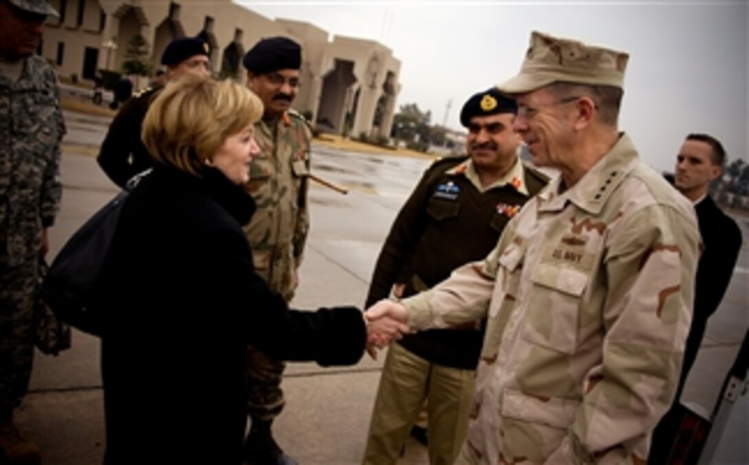 U.S. Ambassador to Pakistan Anne W. Patterson greets U.S. Navy Adm. Michael G. Mullen, chairman of the Joint Chiefs of Staff, upon his arrival in Islamabad, Feb. 8, 2008. 