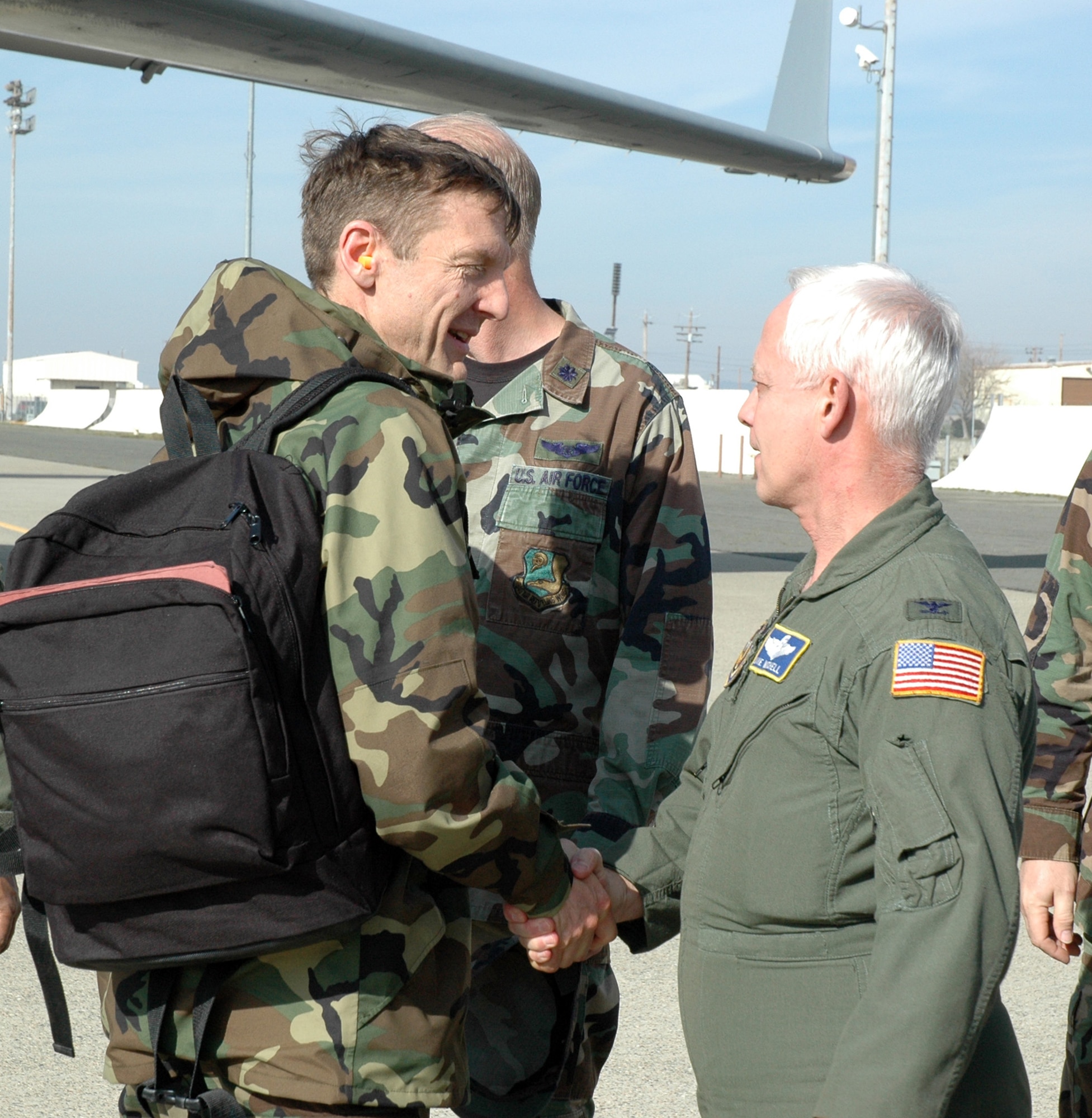 940th Air Refueling Wing commander Col. Al Reif is welcomed home to Beale Air Force Base, Calif., by vice commander, Col. David Mitchell. Col. Reif and about 180 Reservists from the Wing had deployed from Feb. 5-9, 2008, to Gulfport, Miss., to participate in their operational readiness inspection. The 452nd Air Mobility Wing, March Air Reserve Base, Calif., and the 445th Airlift Wing, Wright Patterson AFB, Ohio, also took part in this exercise that tests Reservists war fighting skills, and their ability to deploy and survive in a hostile environment. (US Air Force photo/Master Sgt Ellen L Hatfield)