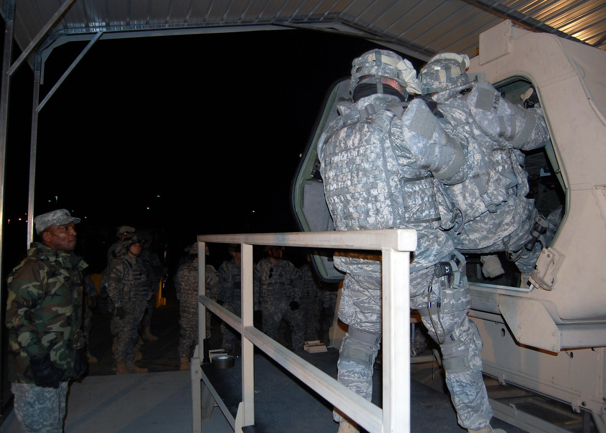 A Provincial Reconstruction Team Gardez member pulls a teammate from inside an overturned humvee during H.E.A.T., or “HMMWV Egress Assistance Training” at Fort Bragg, N.C. A Scripps-Howard News Service analysis from 2005 stated 1 in 4 casualties in the theater of operations were related to humvee accidents and rollovers during IEDs and other attacks and incidents. The H.E.A.T. prepares service members on how to react in the event their humvee rolls over.   (U.S. Air Force photo/Capt. Ken Hall)