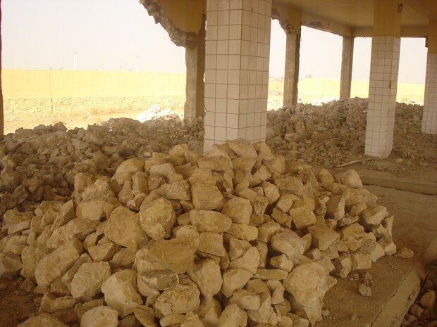 RAMADI, Iraq (September 6, 2008) – (Before) - The ruins of the old Ramadi slaughter house Feb. 9. Coalition forces recently rebuilt and opened the city’s only slaughter house in an economically depressed section of south Ramadi. The slaughter house was rebuilt in the same place to help facilitate growth in the area. To further attract the locals to use the facility, the slaughter house is offering free sheep feed.::r::::n:: (Courtesy photo)::r::::n::