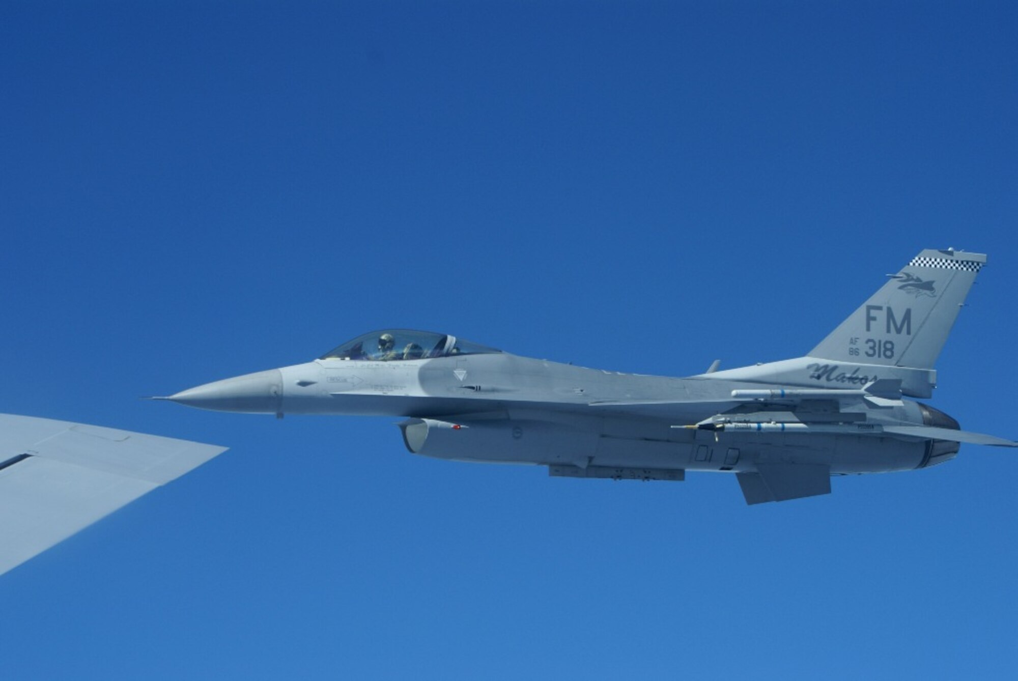 A 93rd Fighter Squadron pilot pulls up alongside a KC-135 Stratotanker during an air refueling training mission with an aircrew from Tinker Air Force Base, Okla., on Feb. 9. The KC-135 crew was on a temporary duty assignment to Homestead ARB, and offered to take 30 Homestead Air Reserve Base reservists along for a firsthand look at an air refueling training mission. (U.S. Air Force photo/Senior Airman Solomon Sklon)