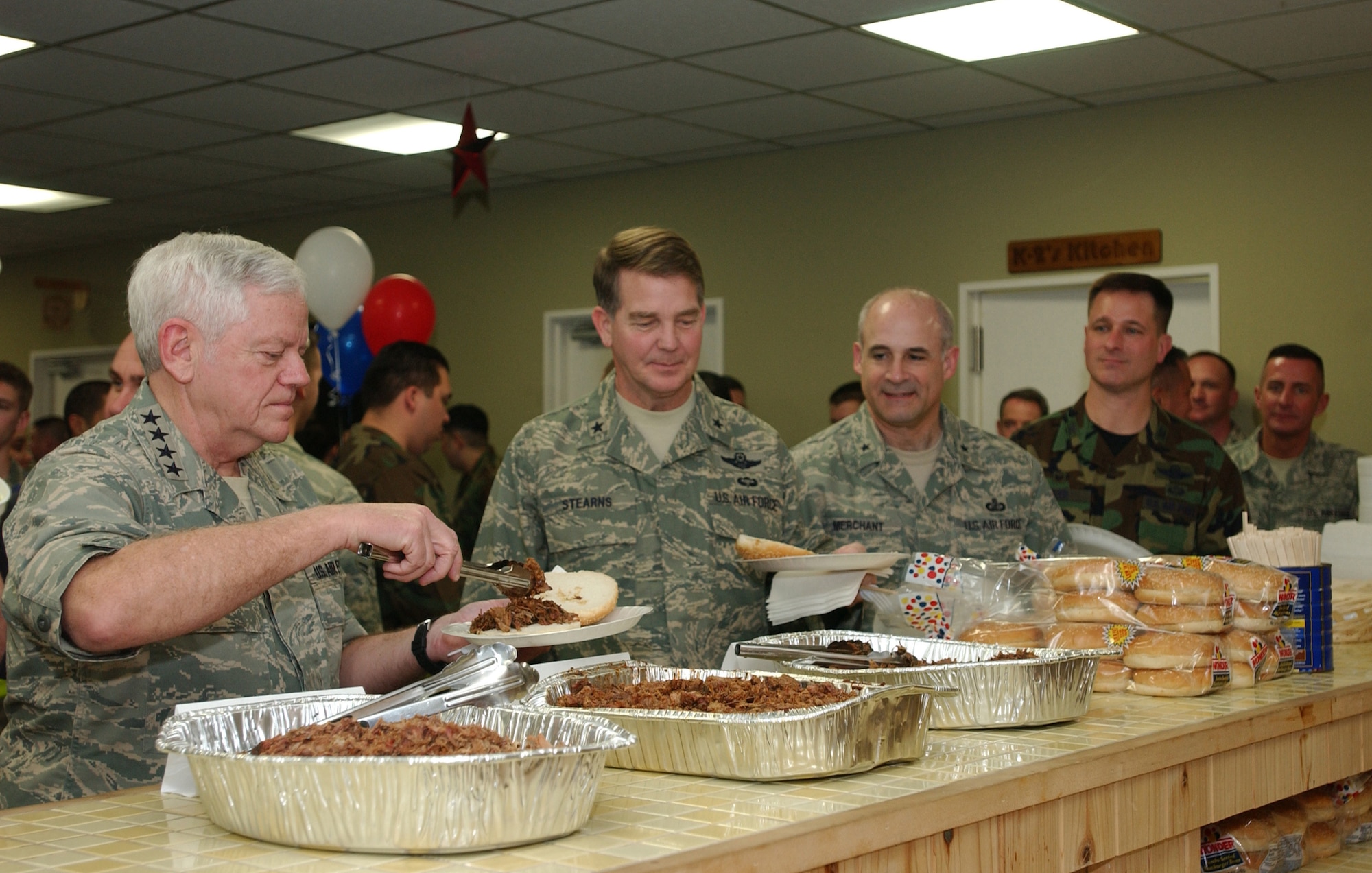 United States Air Force General Arthur J Lichte, the Air Mobility Commander eats with the Airman from the 730th Air Mobility Squadron located Yokota Air Base Japan on 12 Feburary 2008. General Lichte and his council are visiting the pacific regions mobility squardons to see how the air mobility commands men and women are supporting the mission. (United States Air Force photo by Senior Airman Brian Kimball)                               