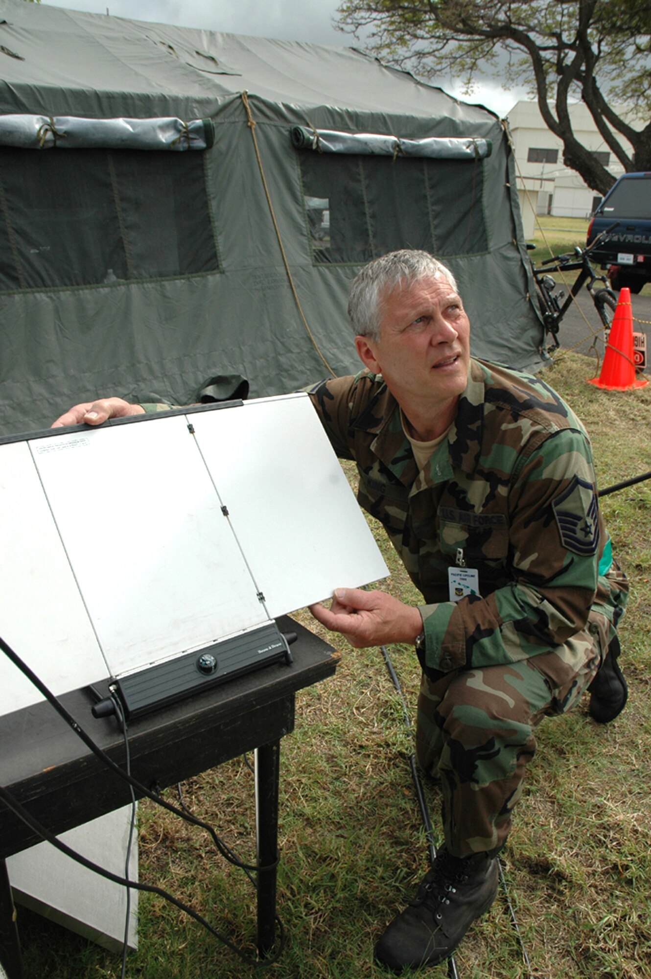 Master Sgt. Kevin King, 446th Airlift Control Flight, McChord Air Force Base, Wash., adjusts an inmersat antenna during Pacific Lifeline Feb. 4.  Pacific Lifeline was a humanitarian assistance disaster response exercise that took place over three Hawaiian Islands Jan. 26 to Feb. 9.  More than 900 Department of Defense personnel participated, including 145 Reservists from the 446th Airlift Wing. (U.S. Air Force photo/Capt. Jennifer Gerhardt) 