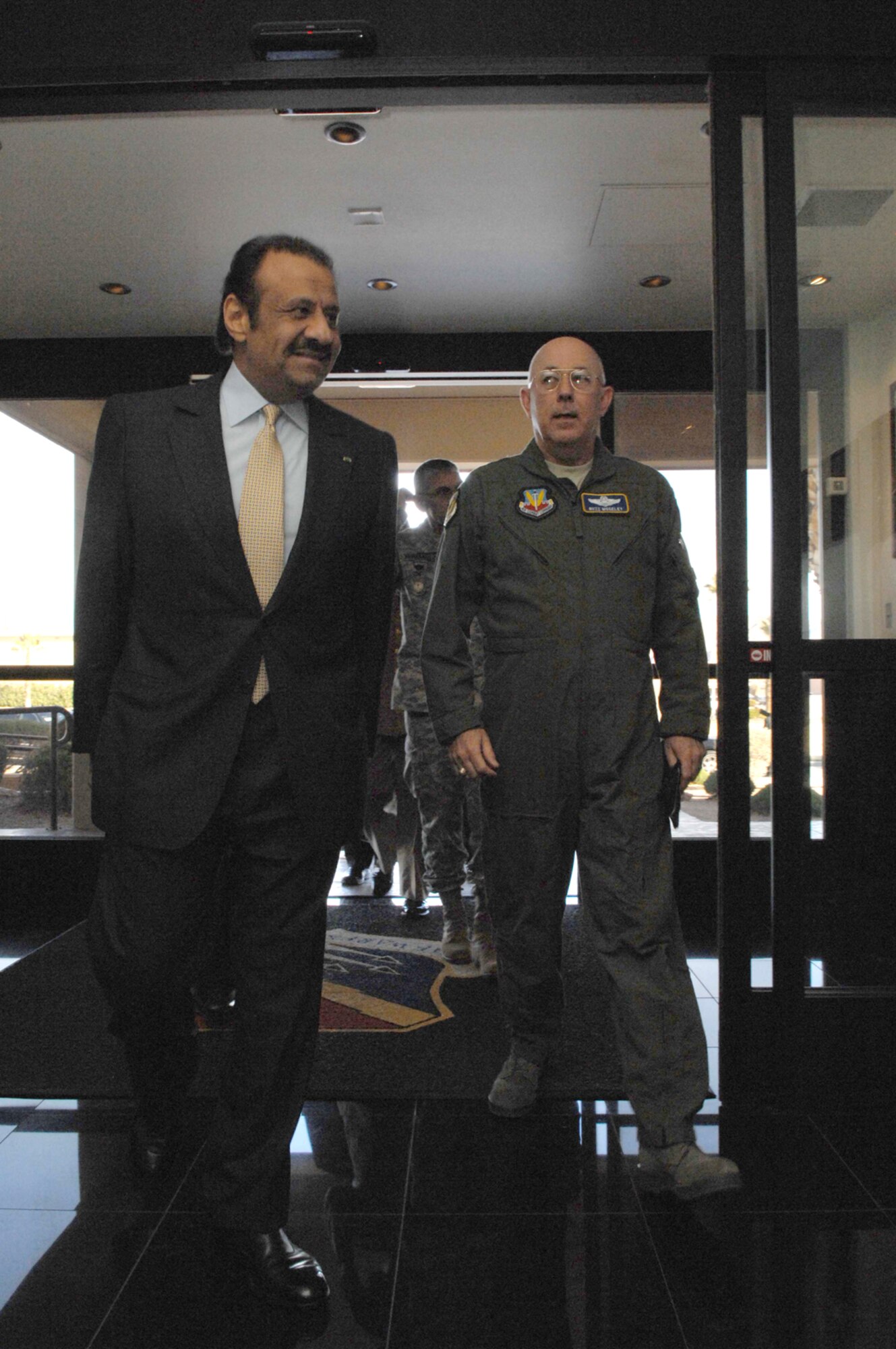NELLIS AIR FORCE BASE, Nev.—U.S. Air Force Chief of Staff Gen. T. Michael Moseley, accompanies His Royal Highness Prince Khalid bin Abdul Aziz Al-Saud to a mission briefing at the United States Air Force Warfare Center here Feb. 8. The prince, who is the Assistant Minister of Defense and Aviation for Military Affairs, arrived at Nellis to observe the Royal Saudi air force's participation during the ongoing Red Flag exercise. (U.S. Air Force photo by Senior Airman Larry E. Reid Jr.)