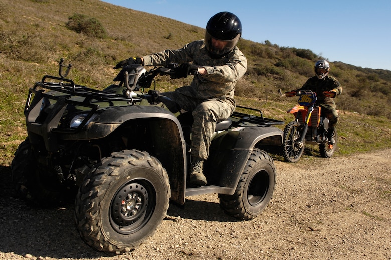VANDENBERG AIR FORCE BASE, Calif. -- Col. Steve Tanous, 30th Space Wing commander, rides on an all-terrain vehicle during the grand opening of the off-highway vehicle park Feb. 8. The initial course is approximately five miles long, but future additions will open more than 30 miles of trails. Individuals interested in utilizing the course must take a safety class and meet vehicle requirements. (U.S. Air Force photo by Airman 1st Class Christian Thomas)