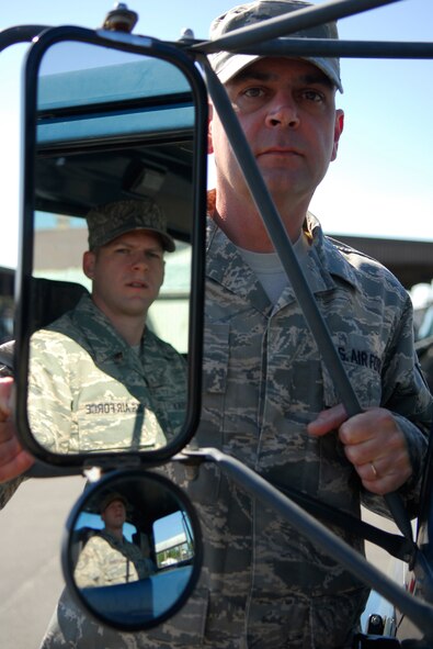 MOODY AIR FORCE BASE, Ga. -- From left, Staff Sgt. Robert Stemcosky, 23rd Logistics Readiness Squadron vehicle operations shift leader, and Tech. Sgt. Reagan Ross, 23rd LRS vehicle operations supervisor. Both Airmen were recently recognized for their efforts as convoy leadership during thier recent deployment to Iraq. (U.S. Air Force photo by Tech. Sgt. Parker Gyokeres) 

