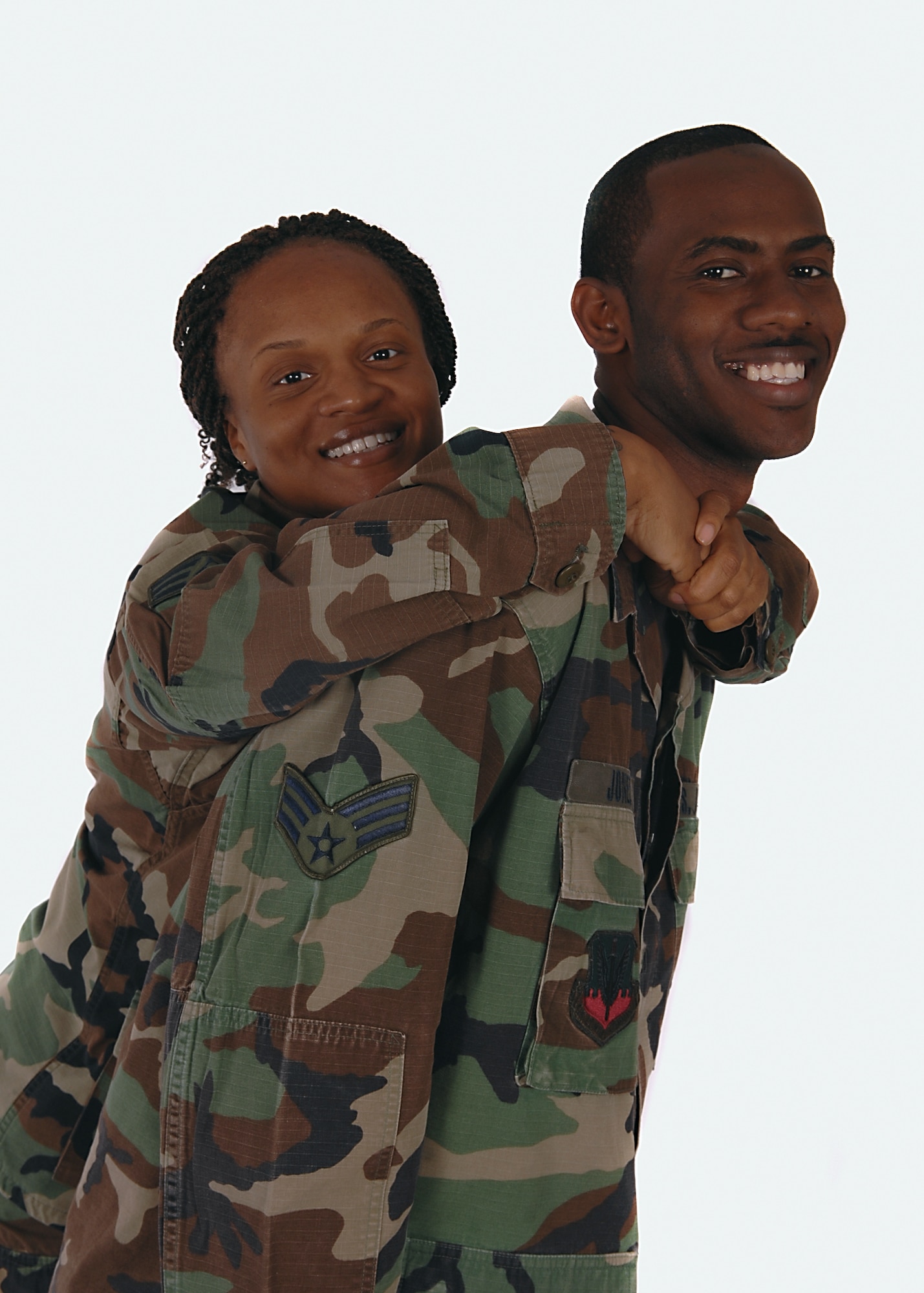 MOODY AIR FORCE BASE, Ga. -- Senior Airman Schelli Jones, 23rd Wing photographer and her husband Senior Airman Merrill Jones, 23rd Civil Engeineering Squadron heating and air conditioning journeyman are a featured military couple for Valentine's Day here. The couple became engaged on Valentine's Day of 2006. (U.S. Air Force photo by Airman 1st Class Brittany Barker) 