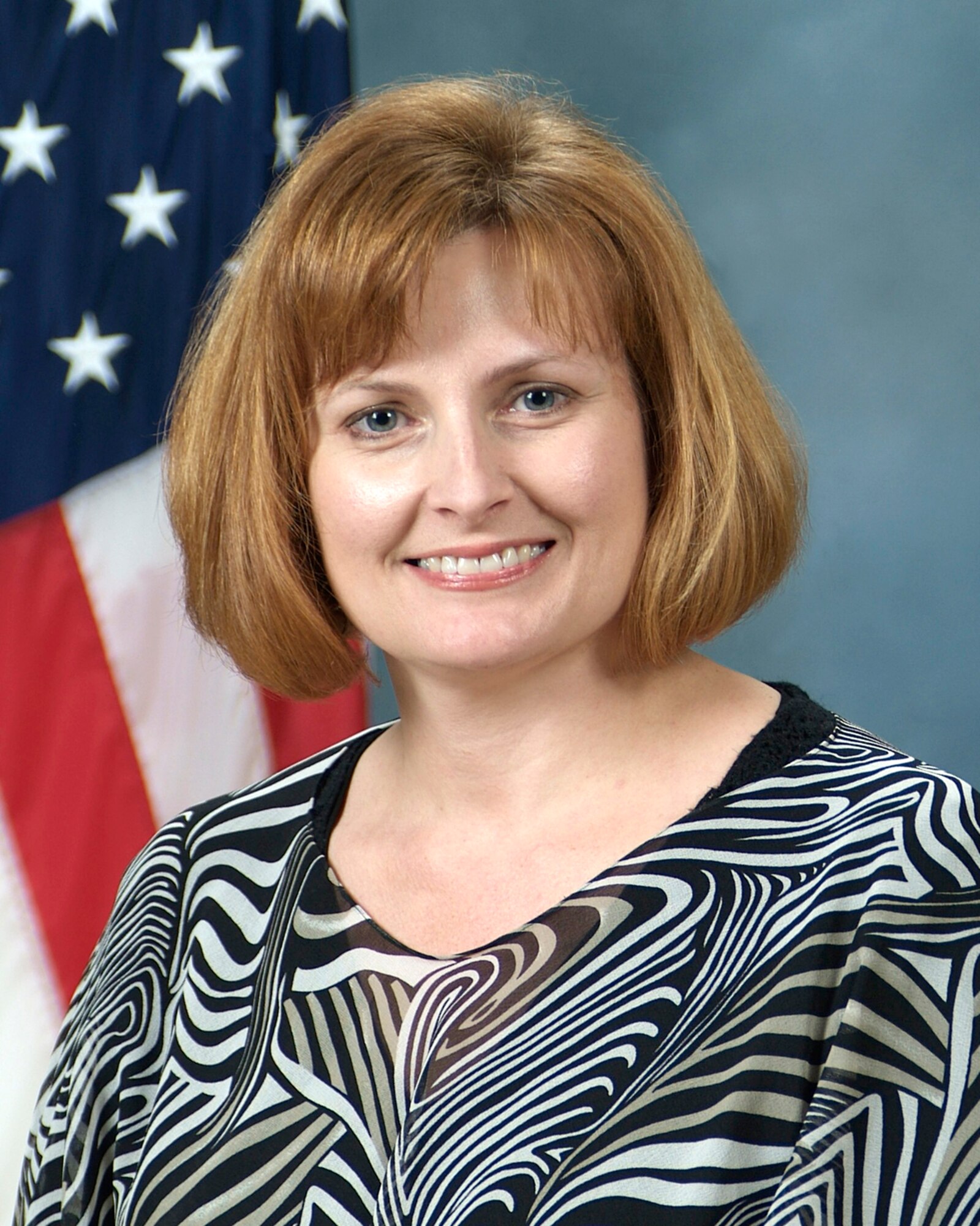 Amy Wren, from the Peterson Spouses Club, has served as the organization's president for two years. As president, she provided unprecedented support to all active and retired military spouses regardless of rank. She oversaw the Peterson Thrift Shop which generates more than $20,000 in revenue annually for the welfare and scholarship fund. Never missing a meeting or function, she directed several vital programs, including Right Start, the Peterson Spouse’s Club Web site and newsletter and acted as the liaison for the American Red Cross. Ms. Wren re-introduced the “Meals While Mending Program” providing comfort for members in need. She also coordinated with more than 650 students to support “Donuts with Dad” and “Muffins with Mom.” Finally, her dedication to the Peterson Spouses Club fundraisers increased revenue 600 percent. (U.S. Air Force photo)
