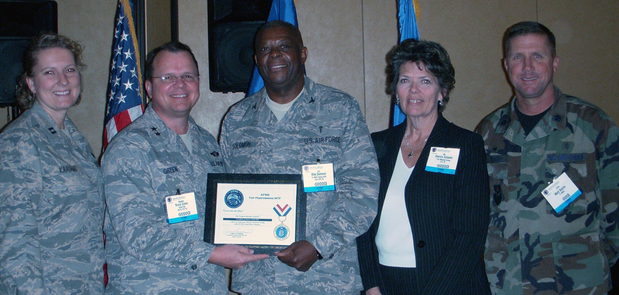 Capt. Jaime Kaauamo, Maj. Gen. Charles Green (Deputy Surgeon General of the U.S. Air Force, presenting the award), Col. Otha Solomon Jr., Sharron Schaefer, Lt. Col. Mark Batcho, 71st Medical Group, receive the award for the Air Force Medical Service Top Performing Military Treatment Facility for Small Clinics in the Continental United States at the 2008 Military Health Services Conference in Washington, D.C. (Courtesy photo)