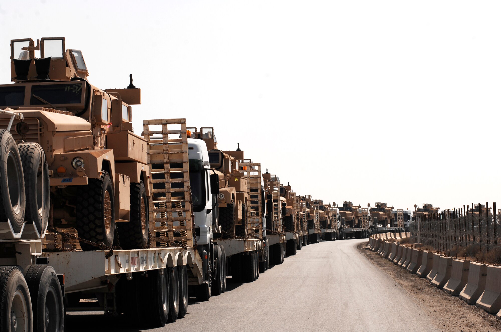 SOUTHWEST ASIA -- A fleet of Mine Resistant Ambush Protected vehicles await transportation to the war fighters on the ground through a Southwest Asia air base Feb. 5, 2008. The MRAP vehicles are a family of armored fighting vehicles designed to survive various types of improvised explosive device attacks and ambushes. These MRAP vehicles are being delivered to the Marine Corps throughout the area of responsibility in support of Operation Iraqi Freedom. (U.S. Air Force photo/ Staff Sergeant Patrick Dixon)
 
