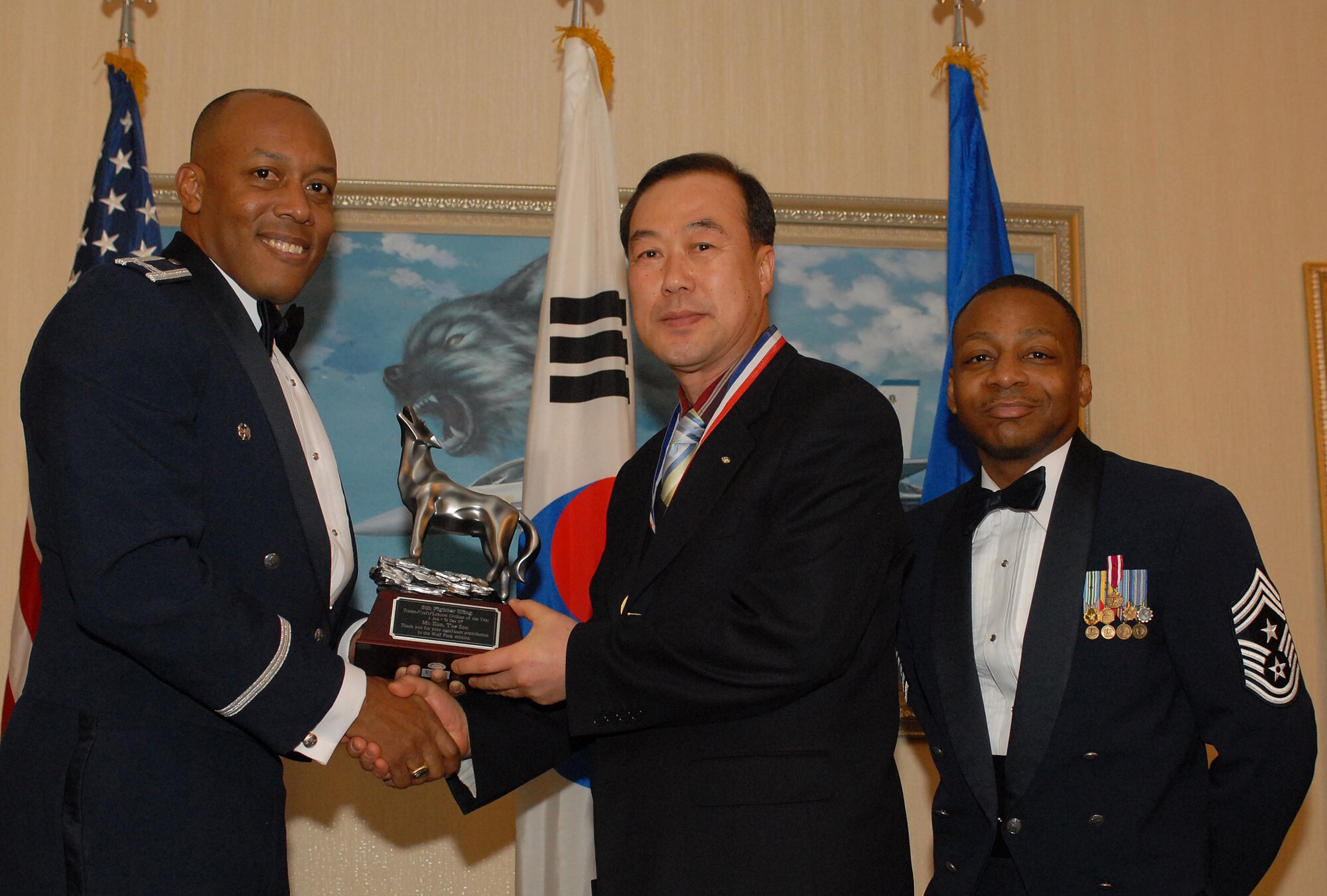 KUNSAN AIR BASE, South Korea -- Mr. Kim TaeSon, 8th Services Squadron, received the Trades/Crafts/Laborer of the year award here Feb 10. The banquet is held annually to recognize all outstanding personnel for their commitment and hard work. (U.S. Air Force photo/Senior Airman Giang Nguyen)