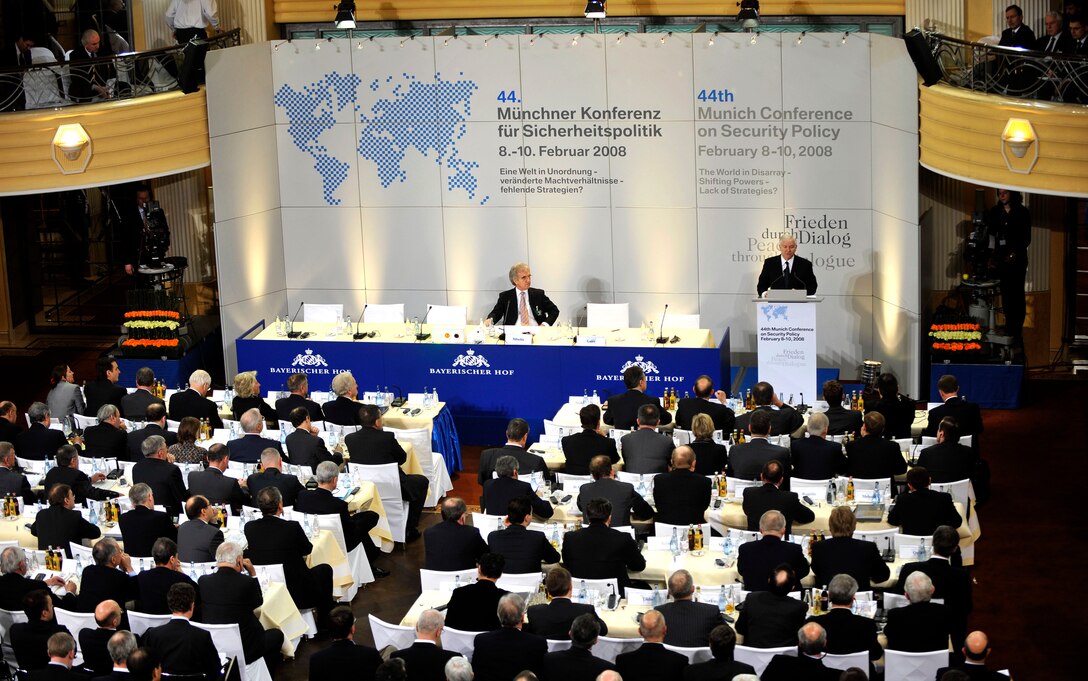 Attendees of the 44th Munich Conference on Security Policy listen as U.S. Defense Secretary Robert M. Gates delivers a speech on security threats posed by terrorists to European nations in Munich, Germany, Feb. 10, 2008.  
