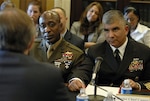 Master Chief Petty Officer of the Navy Joe R. Campa Jr. (right) and Sgt. Major of the Marine Corps Carlton Kent (left) listen intently to a question as they testify before the House Appropriations Subcommittee on Military Construction in Washington, D.C., on Feb. 7, 2008.  Campa, Kent, Sgt. Major of the Army Kenneth Preston and Chief Master Sgt. of the Air Force Rodney McKinley testified on health care, family housing and childcare.  Diana Campa, wife of Master Chief Campa and the U.S. Navy's ombudsman-at-large, joined the senior enlisted leaders in testimony.  