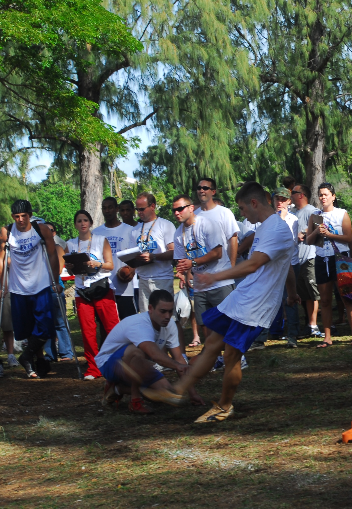 Richard Good drills the ball during the Field Goal competition, which kicked off the NFL military challenge, Feb. 8 at Kapiolani Park, Hawaii. Photo by Staff Sgt. Erin Smith.