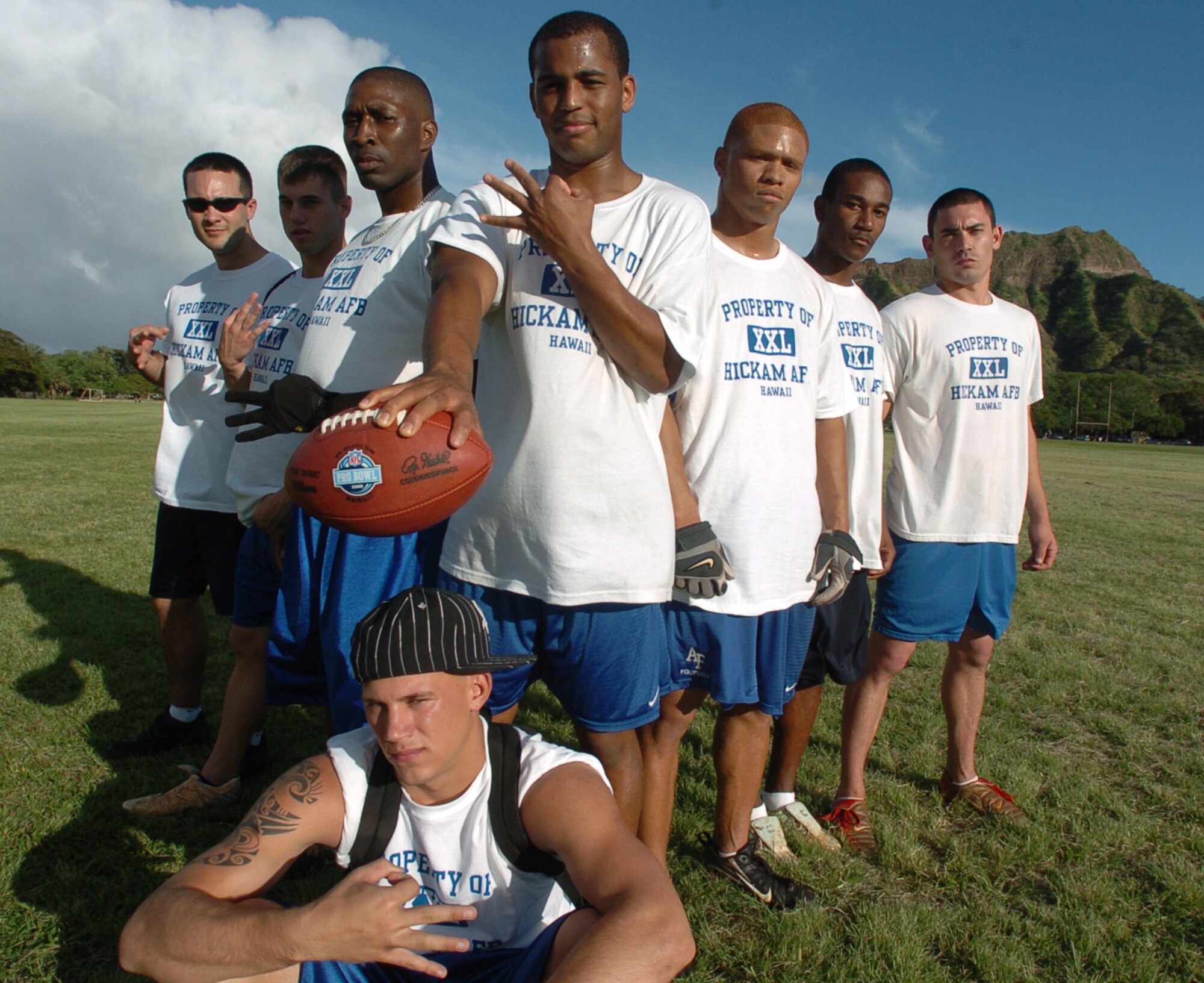 The Air Force team poses in front of Diamond Head Friday after winning its third straight NFL Military Challenge.