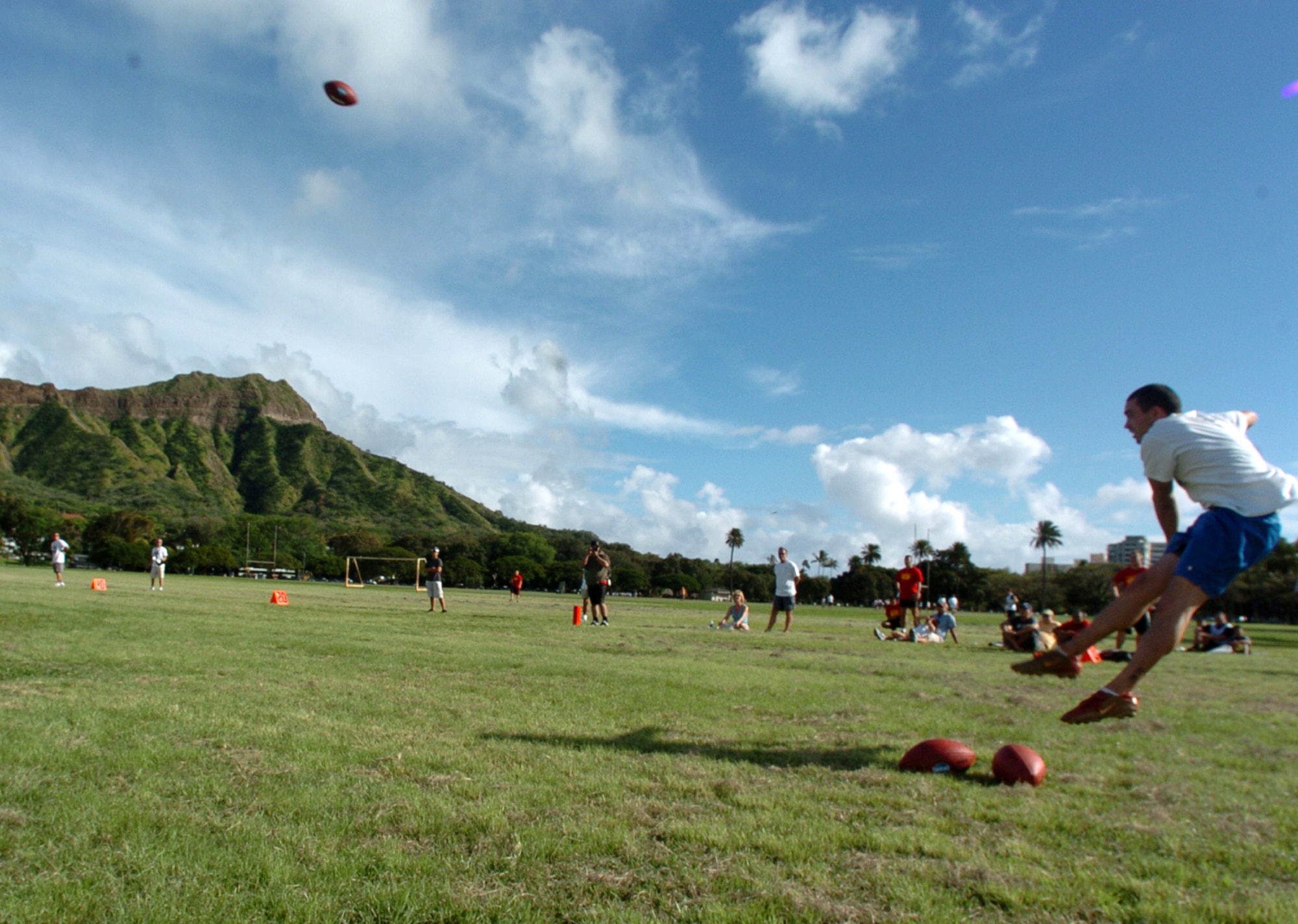 Nate Angel uncorks a 47-yard punt during Friday’s NFL Military Challenge. Angel’s three-punt combined total of 91 yards was good for second place and helped the Team Hickam-rostered players representing the Air Force take first place in the challenge for the third year in a row and fourth in five years. Photo by Mark Munsey.